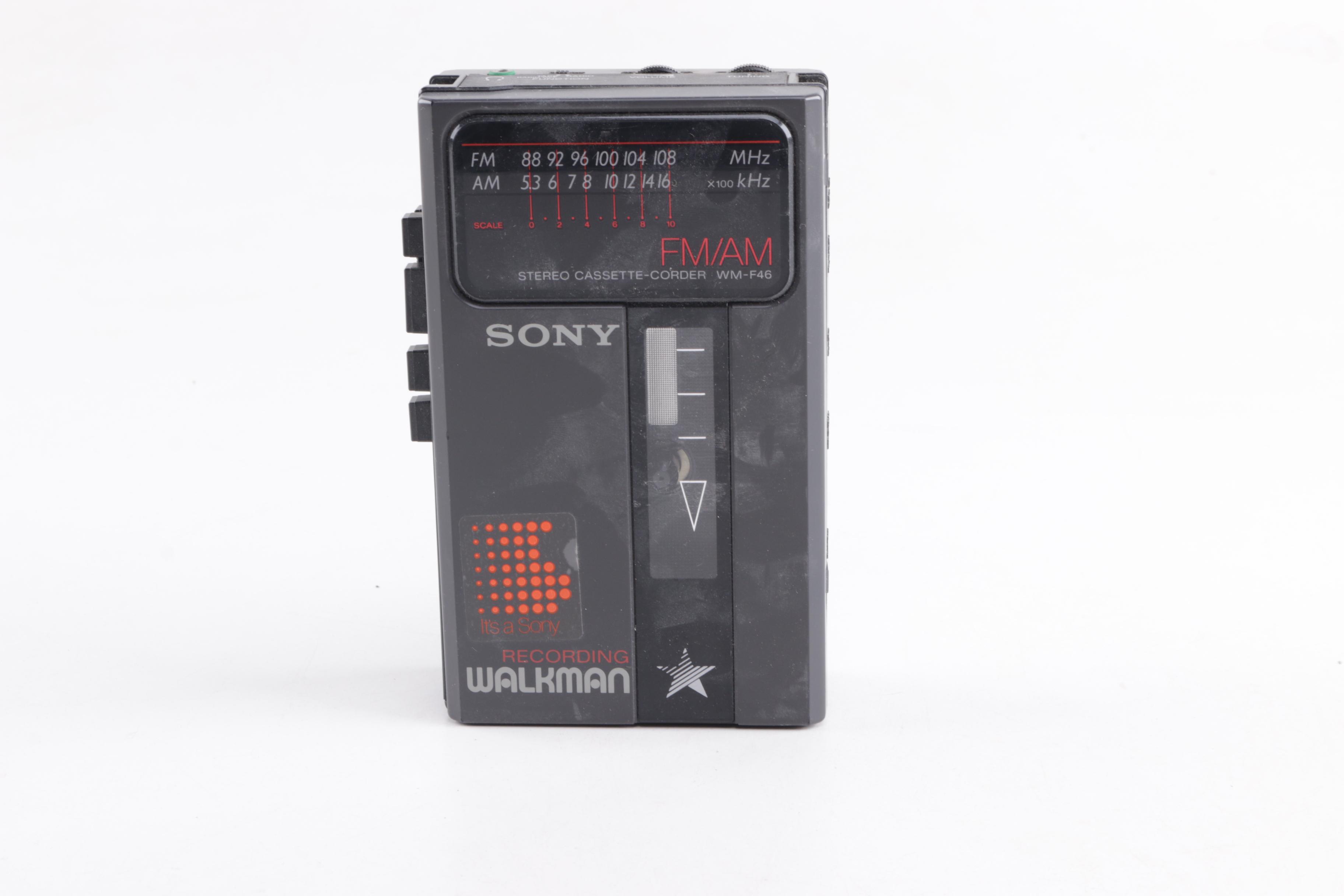 Nikkorex, Yashica, and Topcon 35mm Film Cameras and Sony Walkman