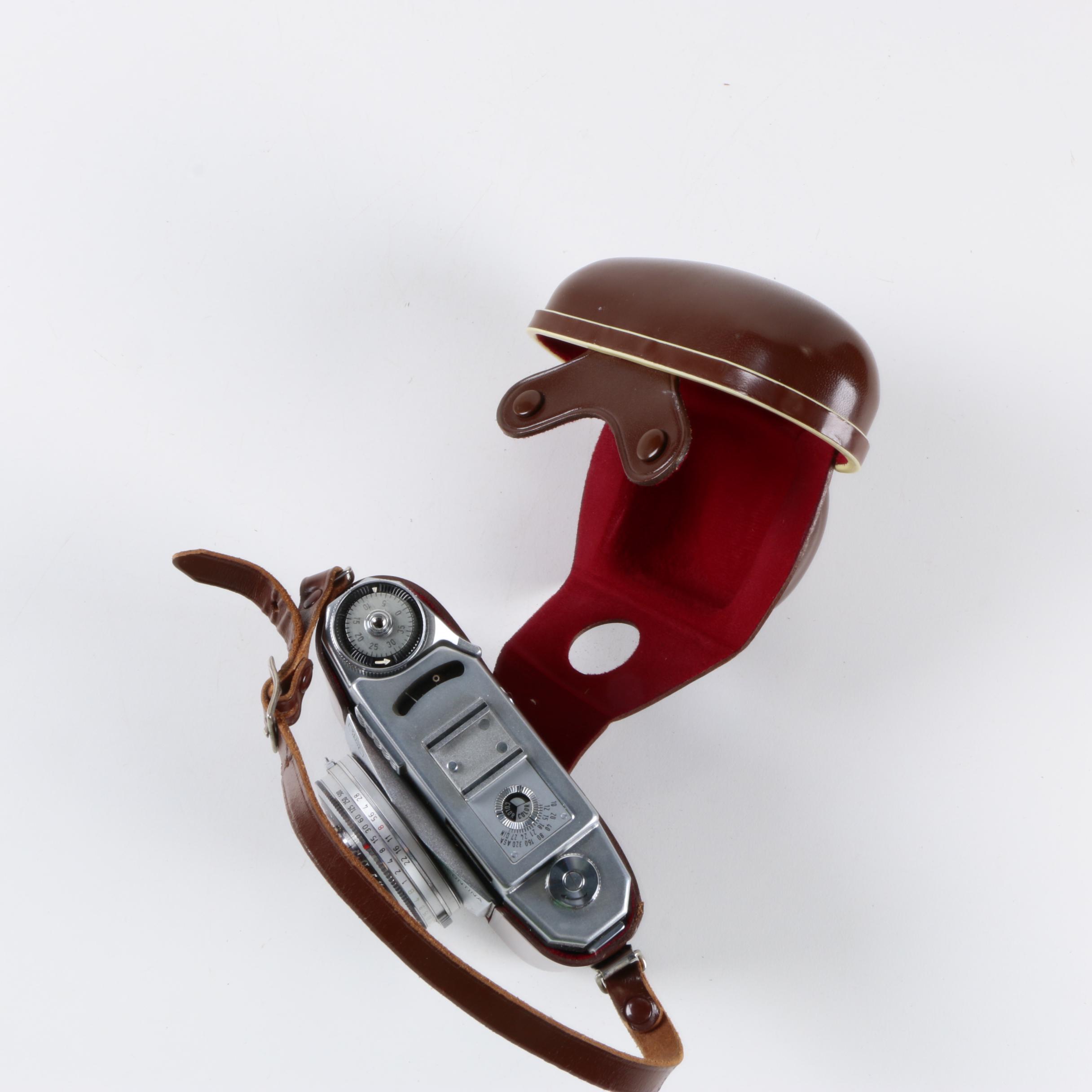 Vintage Zeiss Ikon AG SLR Camera with Two Leather Cases and Accessories