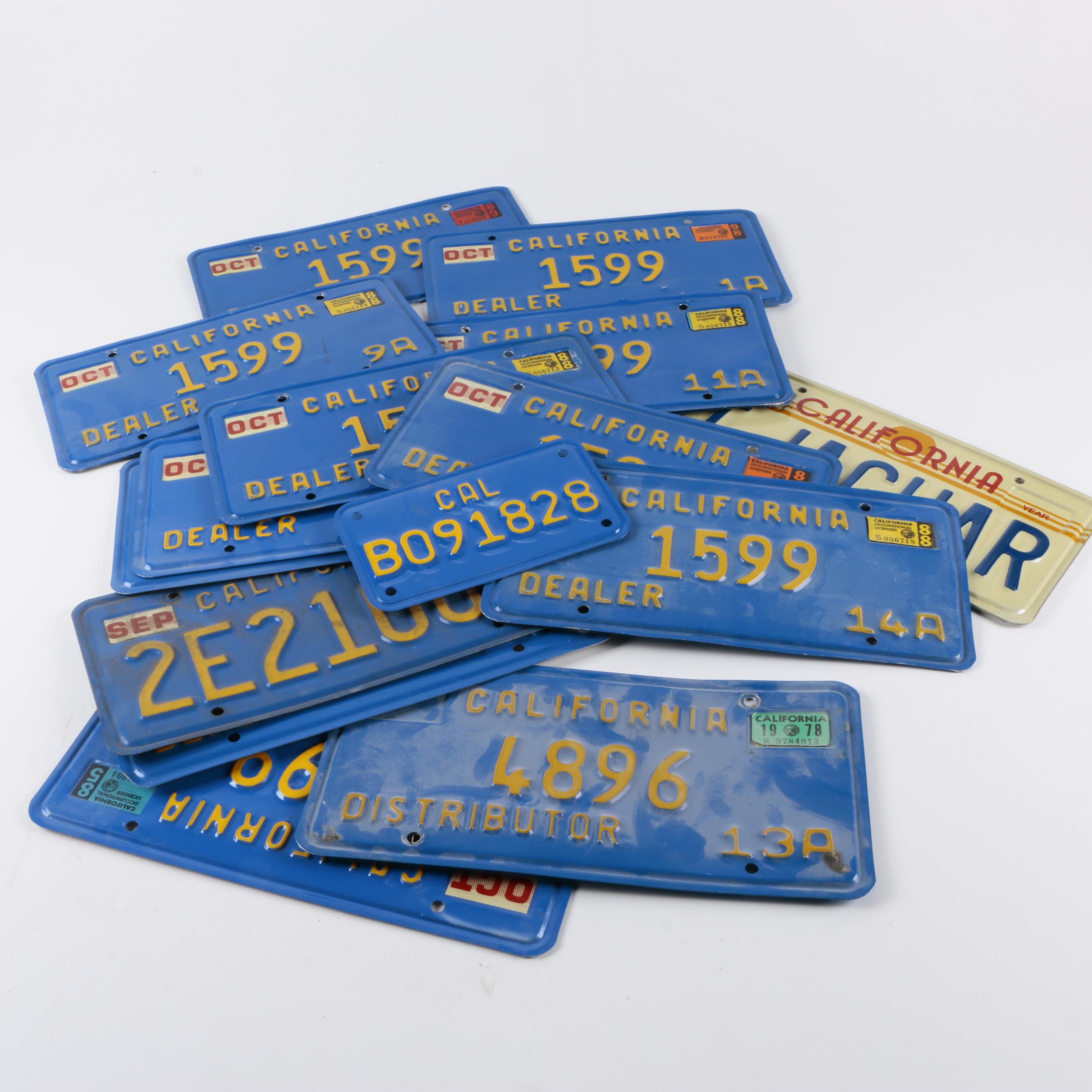 Vintage California License Plates Including Blue/Yellow And Sun Graphic