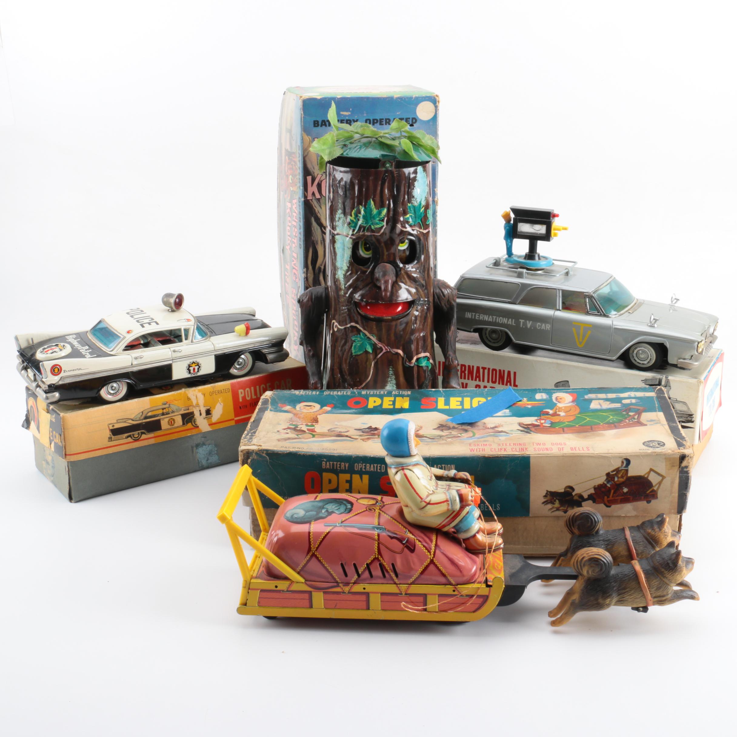 Four Vintage Japanese Metal Battery Operated Toys