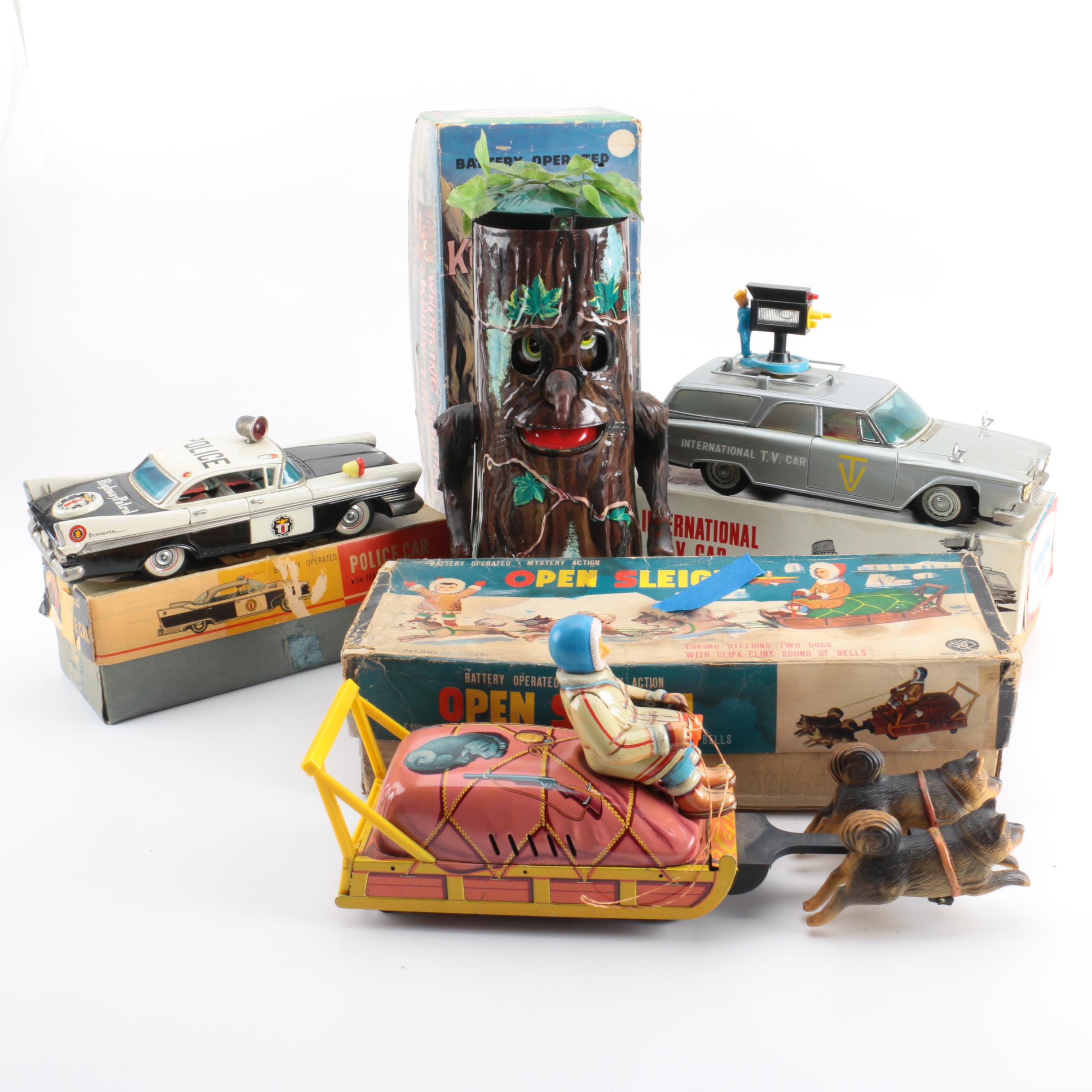 Four Vintage Japanese Metal Battery Operated Toys