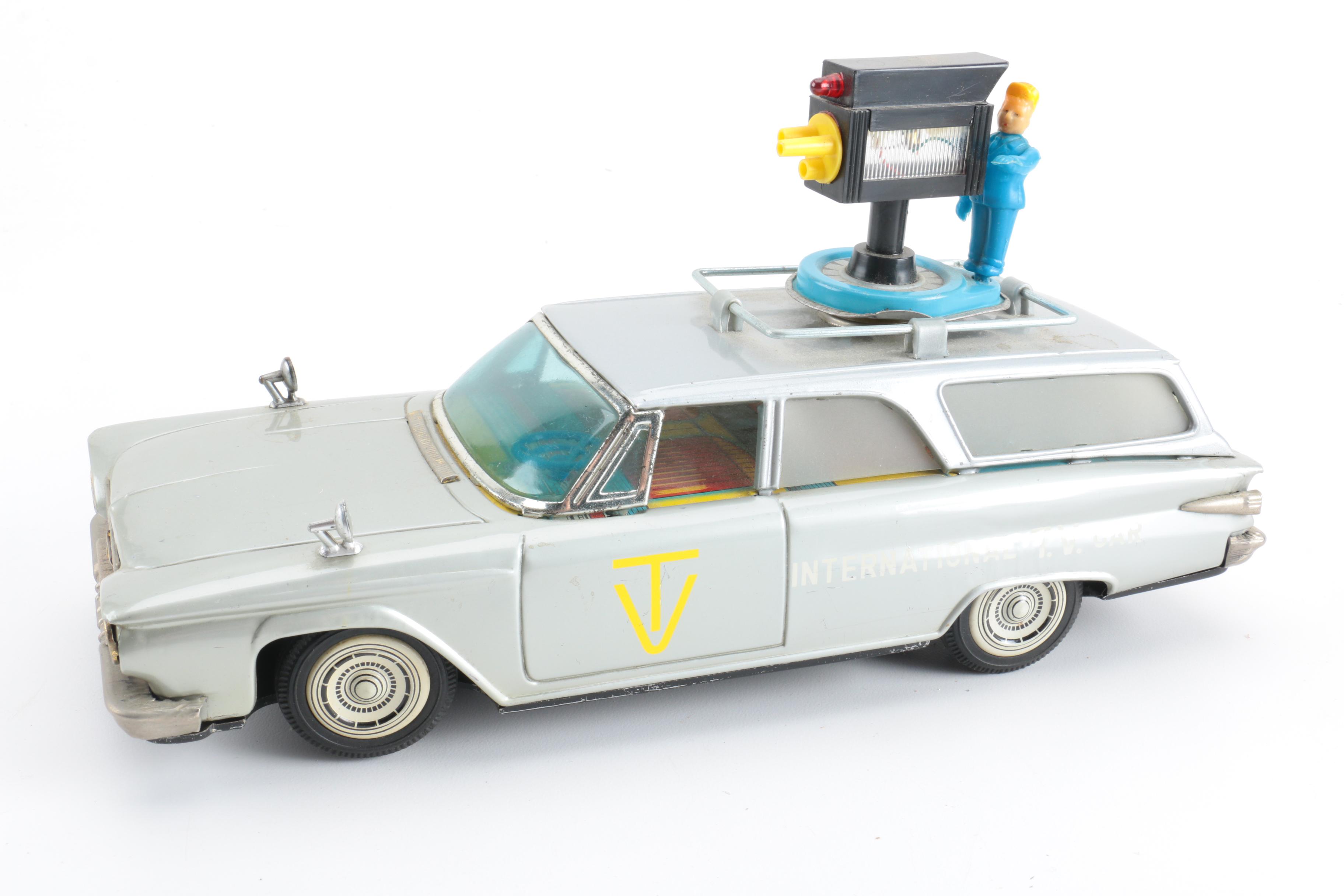 Four Vintage Japanese Metal Battery Operated Toys