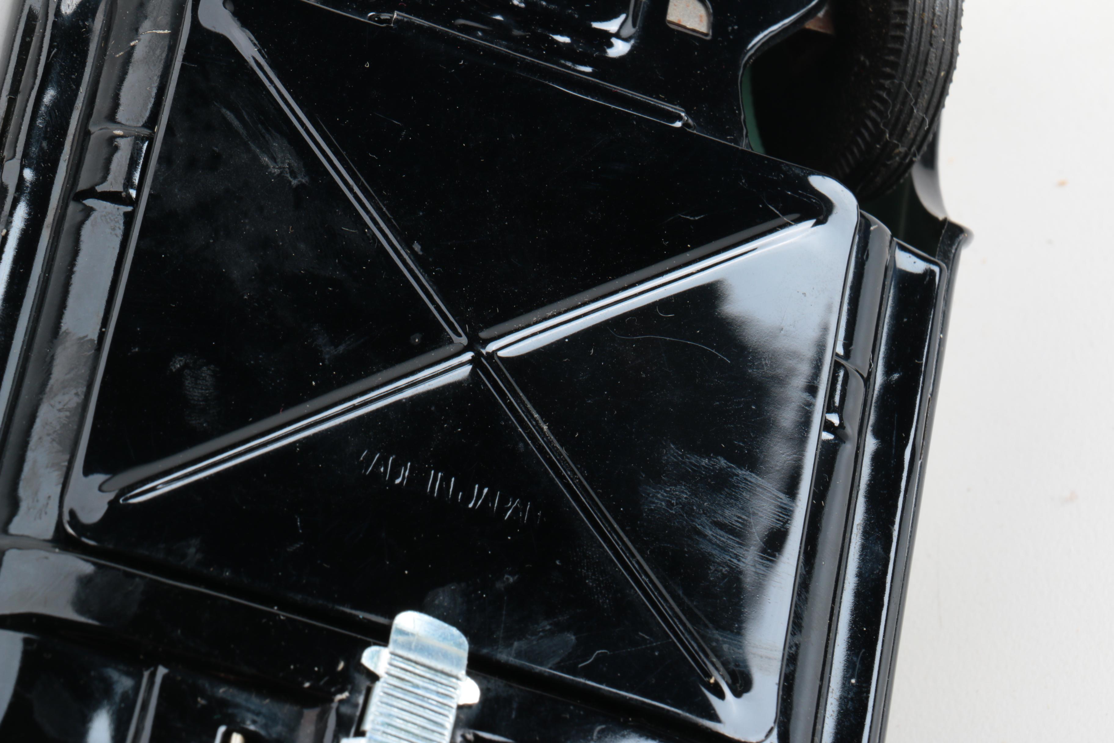 Four Vintage Japanese Metal Battery Operated Toys