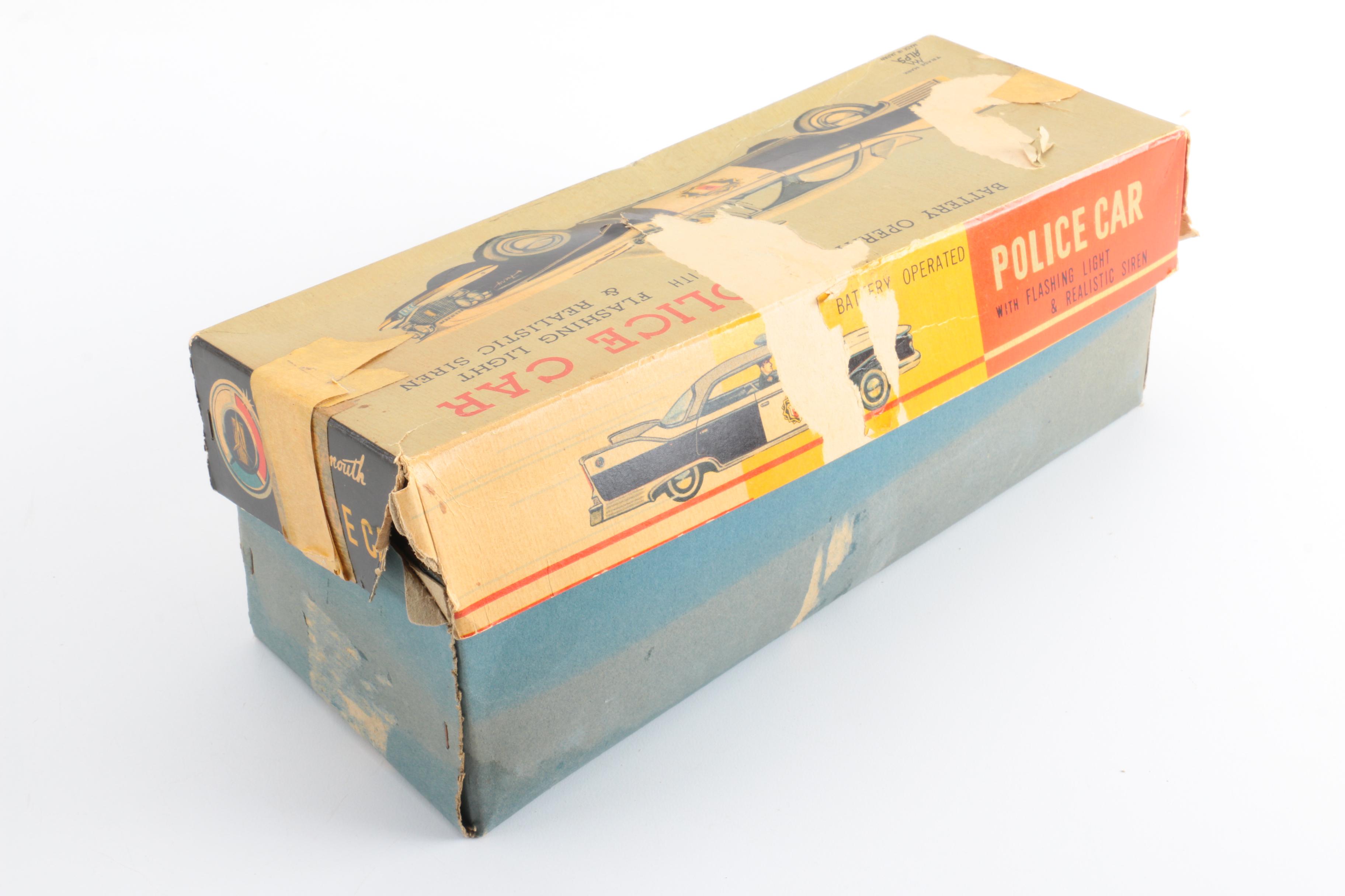 Four Vintage Japanese Metal Battery Operated Toys