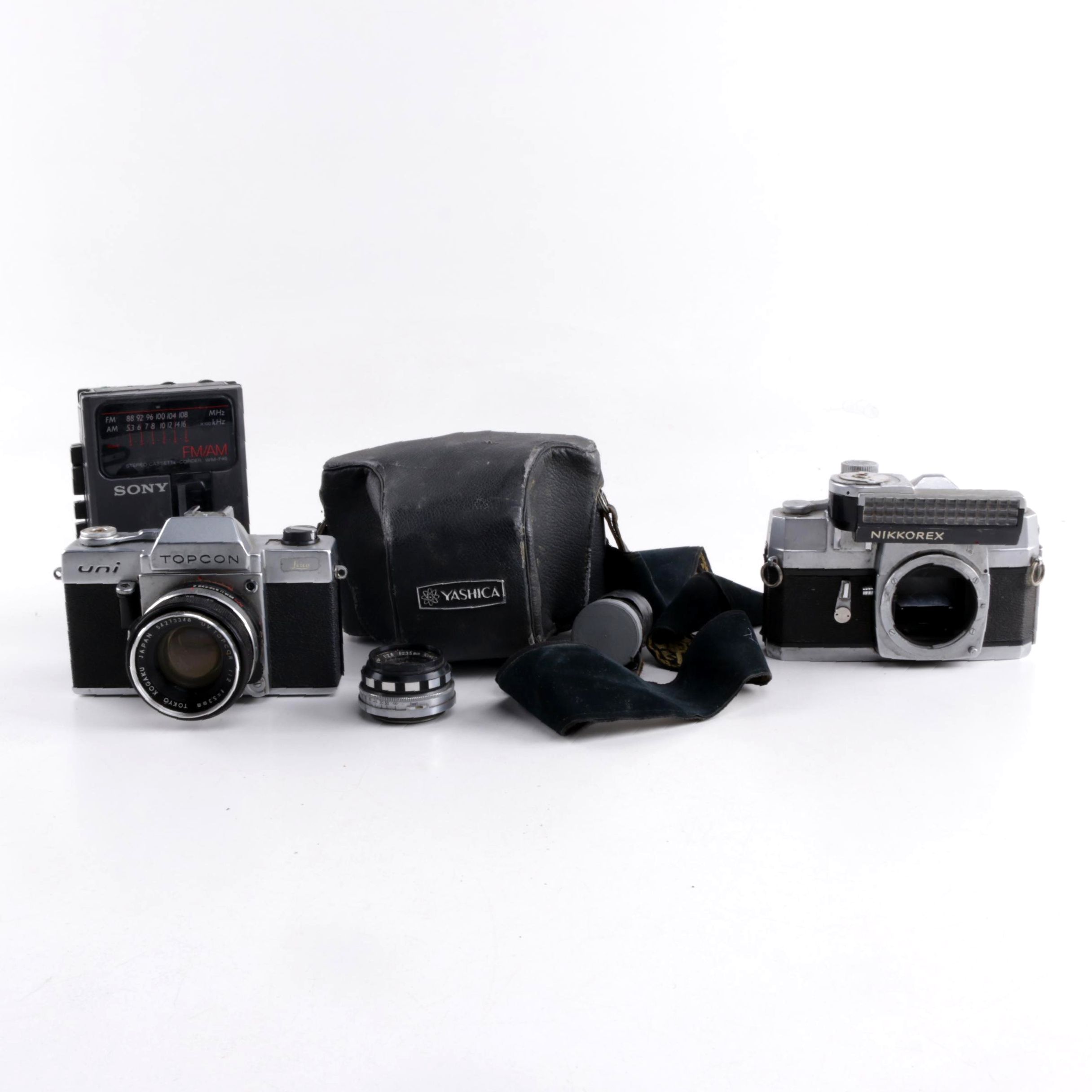 Nikkorex, Yashica, and Topcon 35mm Film Cameras and Sony Walkman