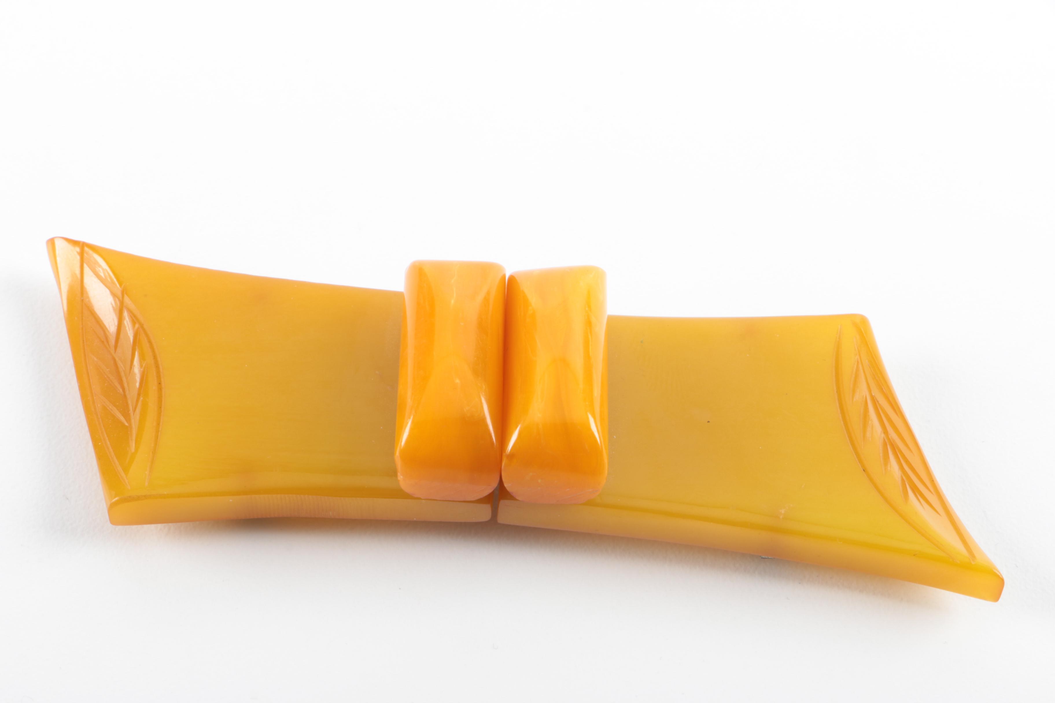 Bakelite Clips and Belt Buckle