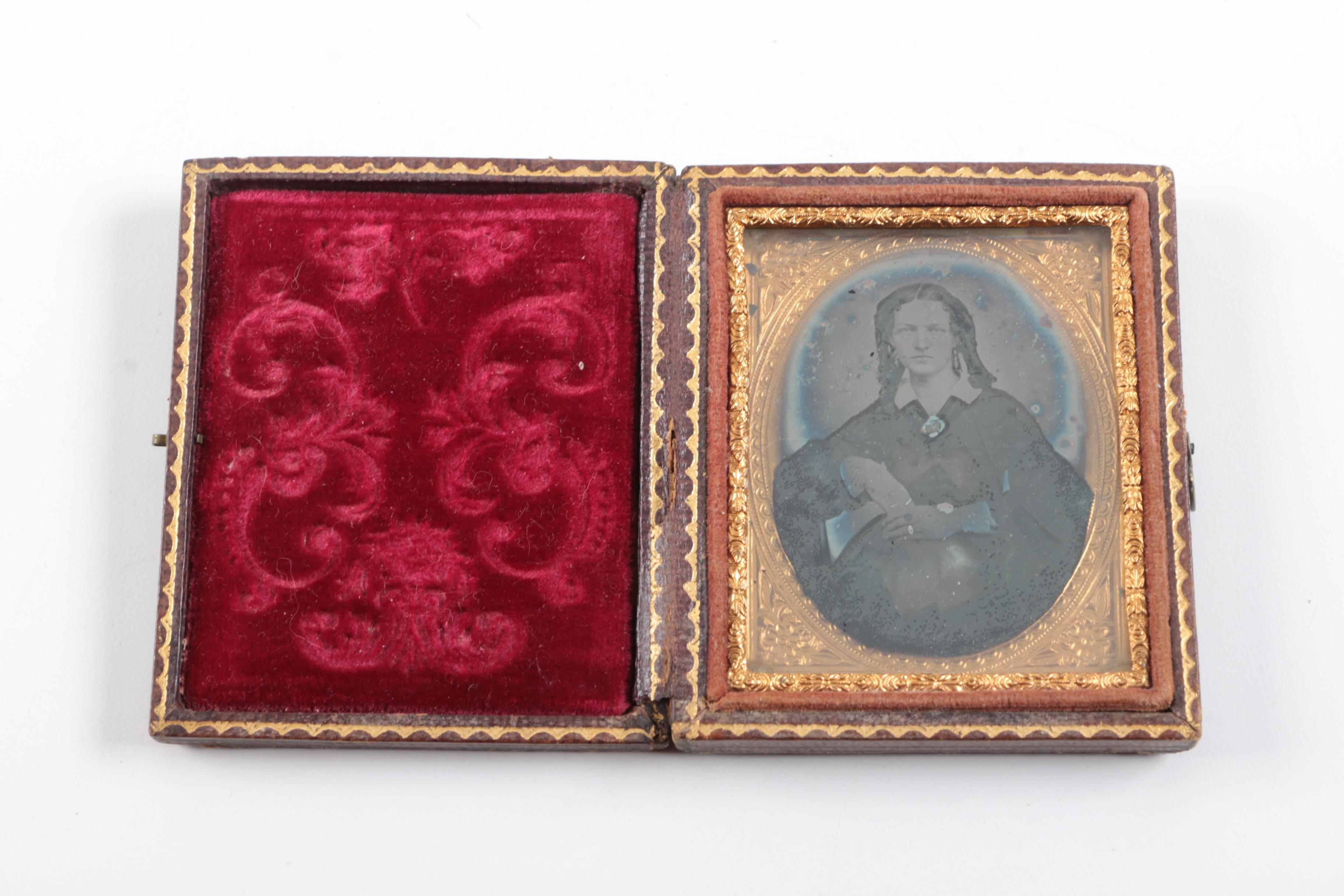 Antique Daguerreotypes In Cases Including Hand-Painted Postmortem Portrait