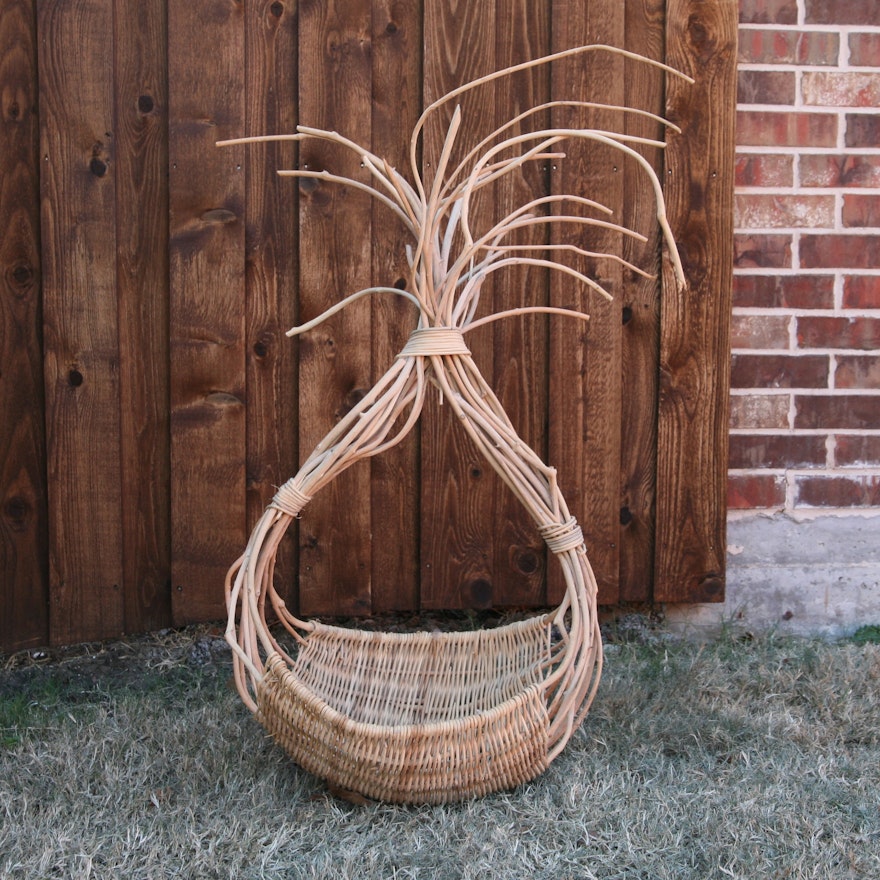 Ornately Handled Woven Basket