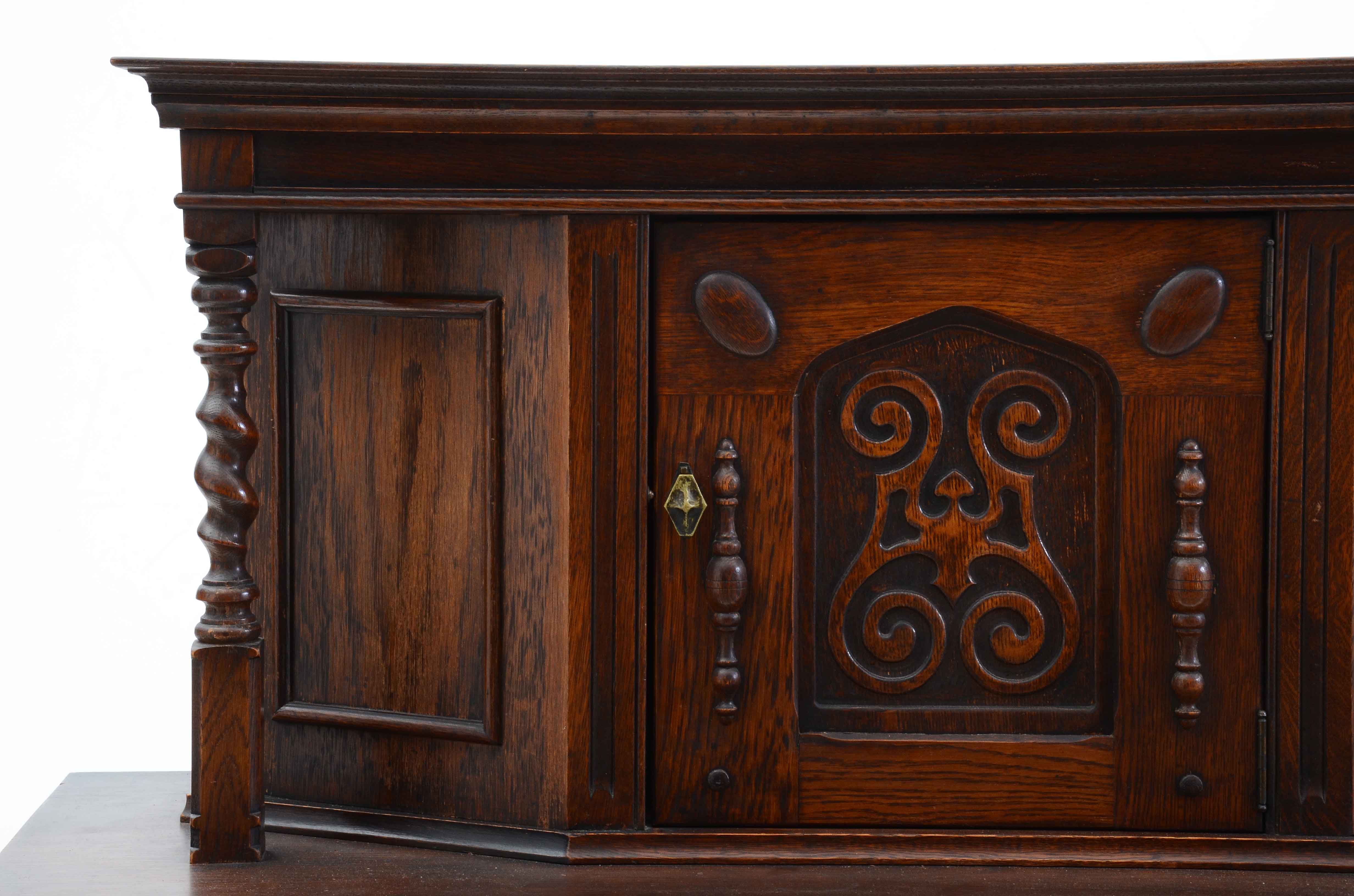 1920s Jacobean Revival Oak China Cabinet by Cochran Chair Co