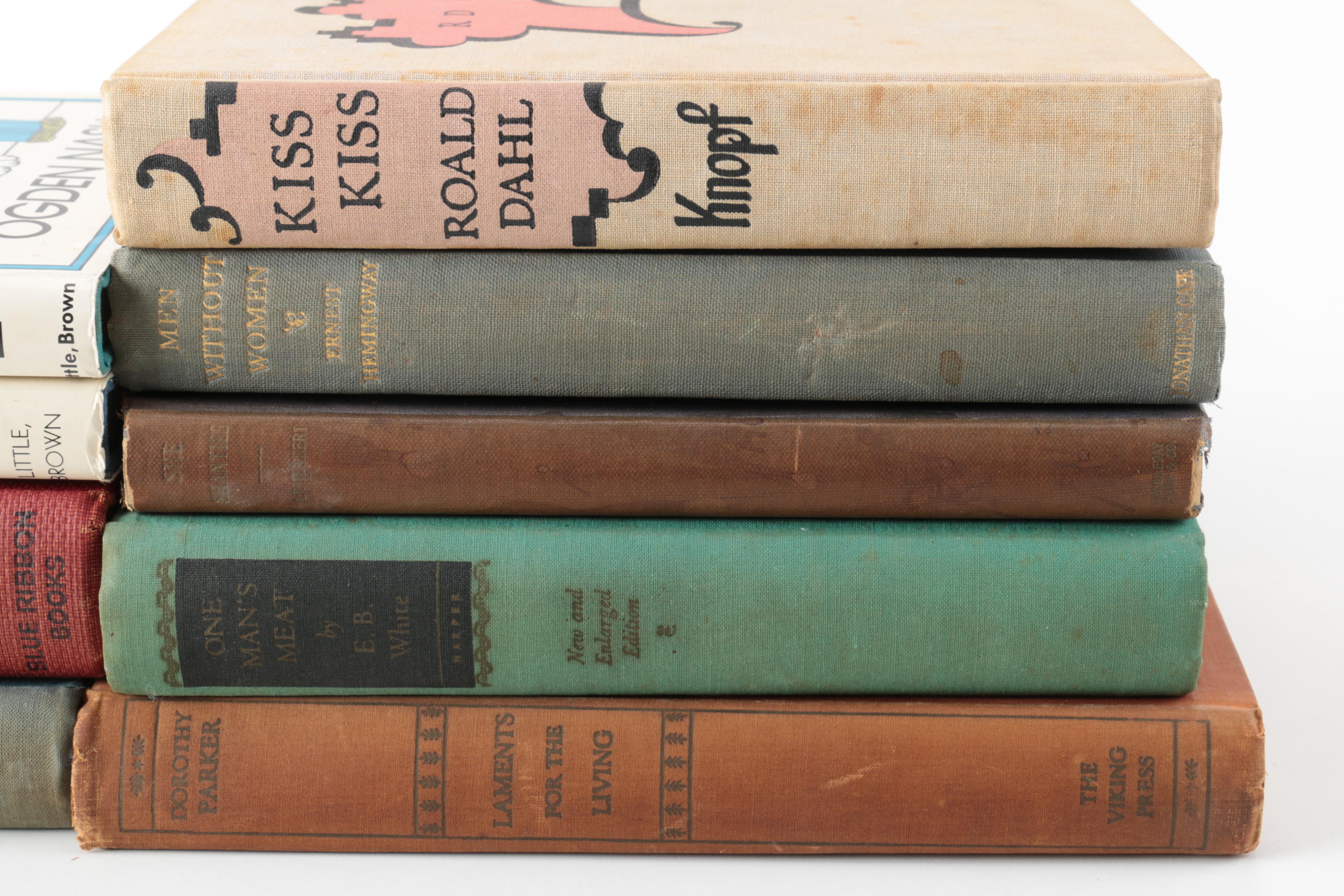 Nine Vintage Hardcover Books Featuring Roald Dahl and Ernest Hemingway