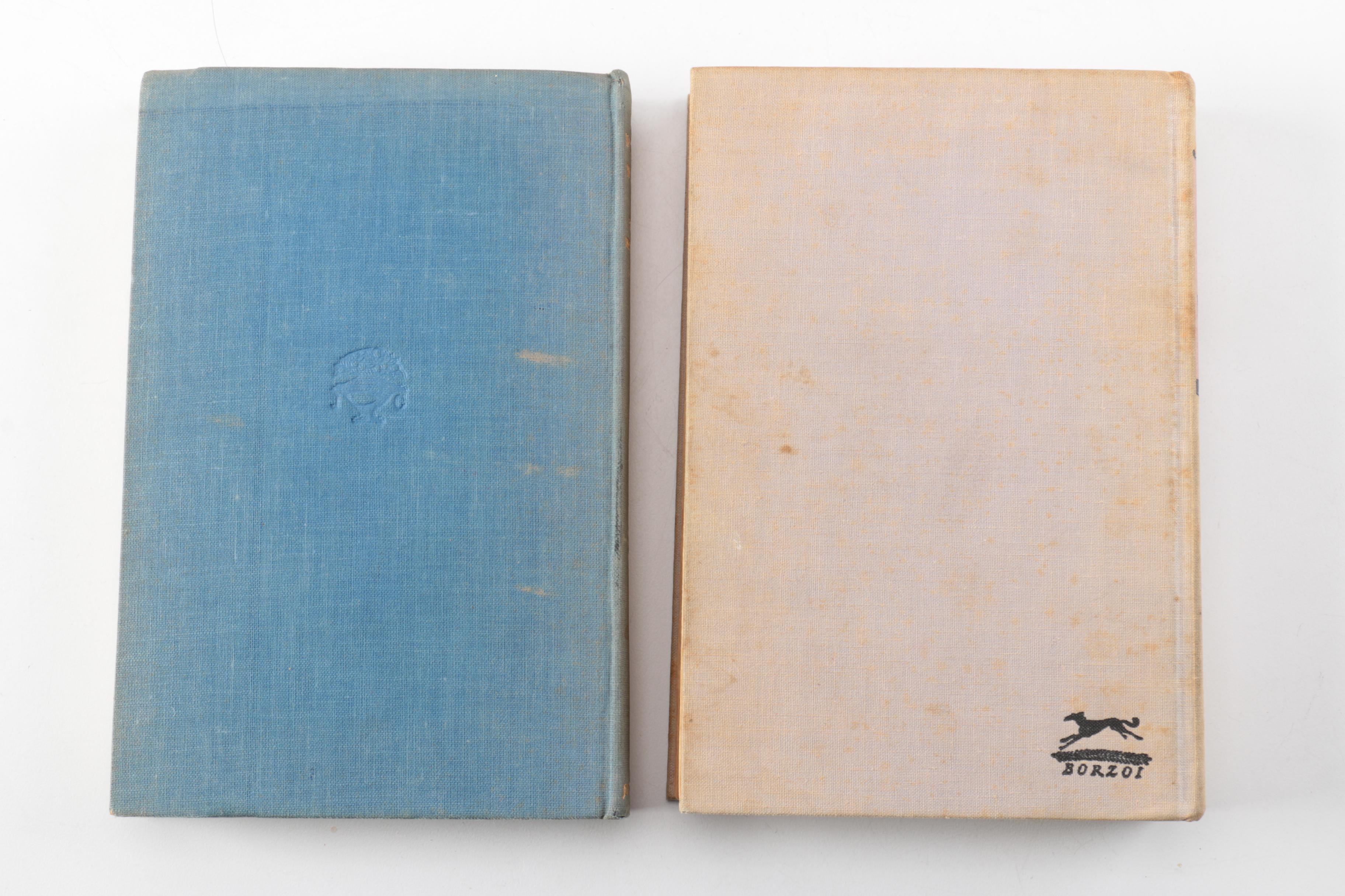 Nine Vintage Hardcover Books Featuring Roald Dahl and Ernest Hemingway