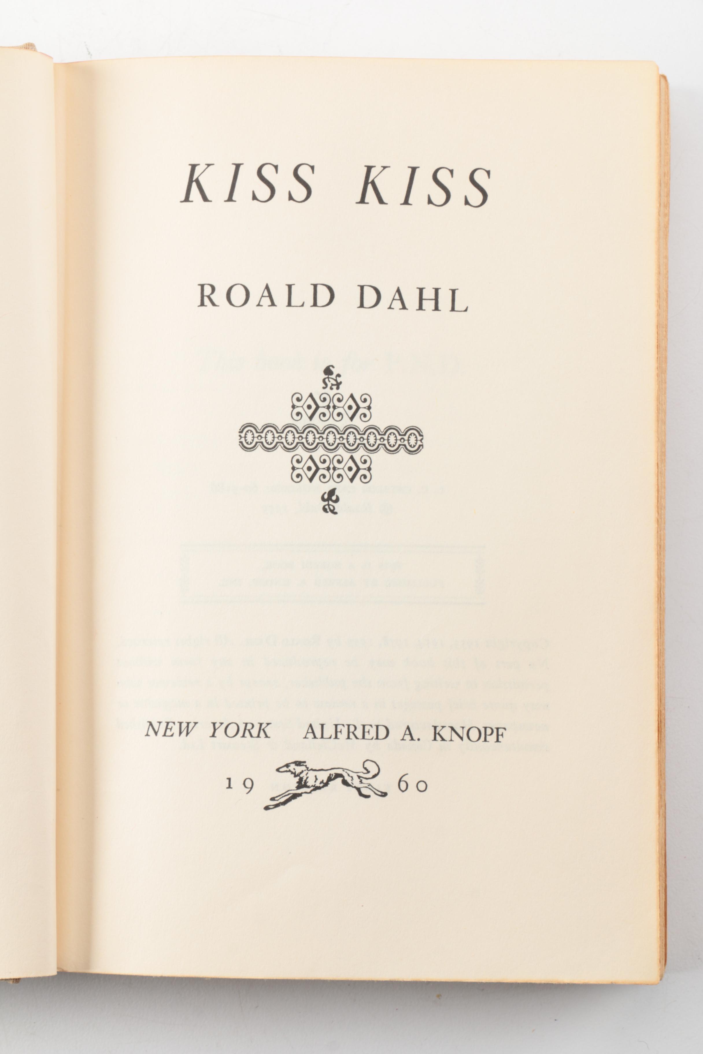 Nine Vintage Hardcover Books Featuring Roald Dahl and Ernest Hemingway