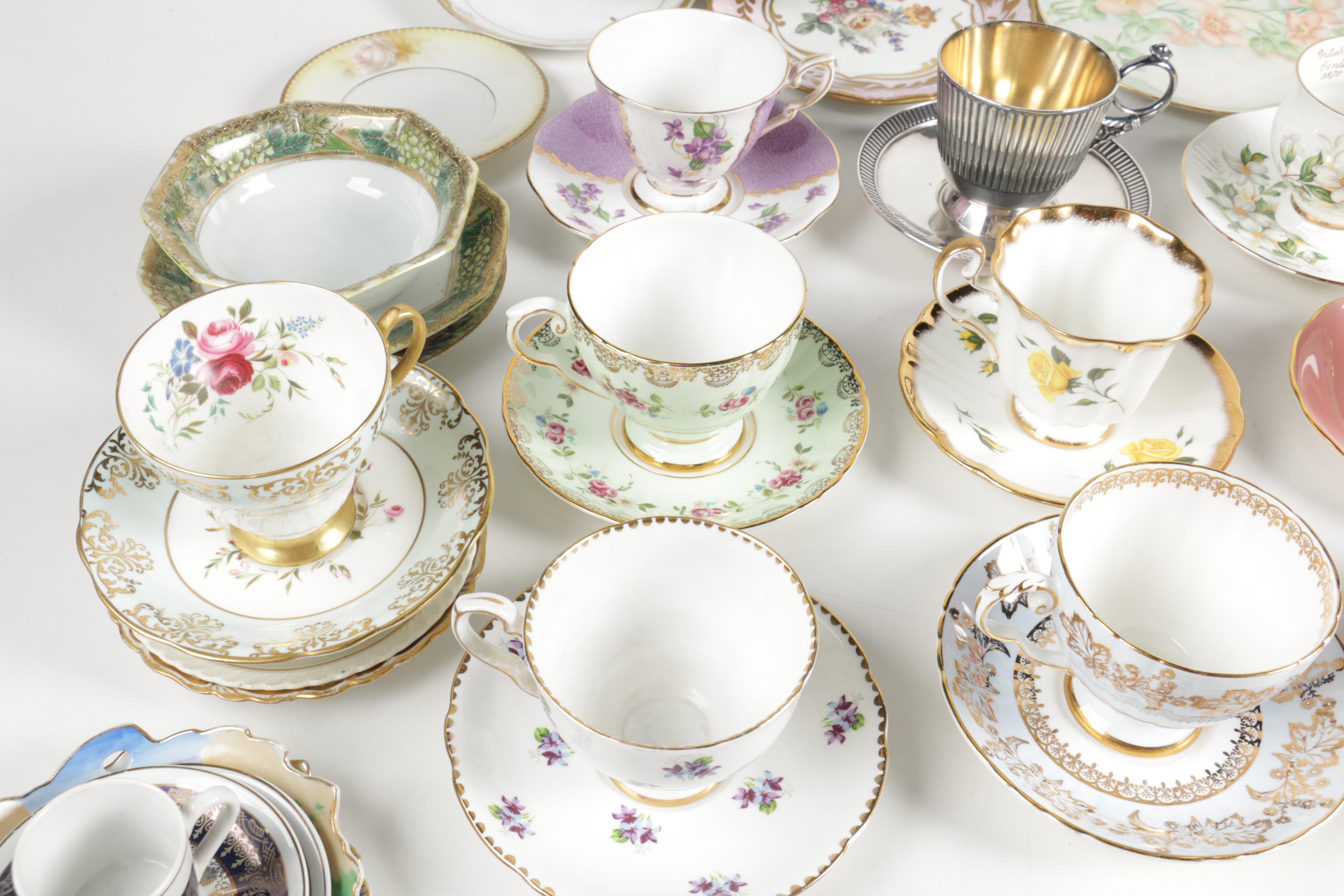 Ceramic Cup, Saucer, and Plate Assortment Including Belleek