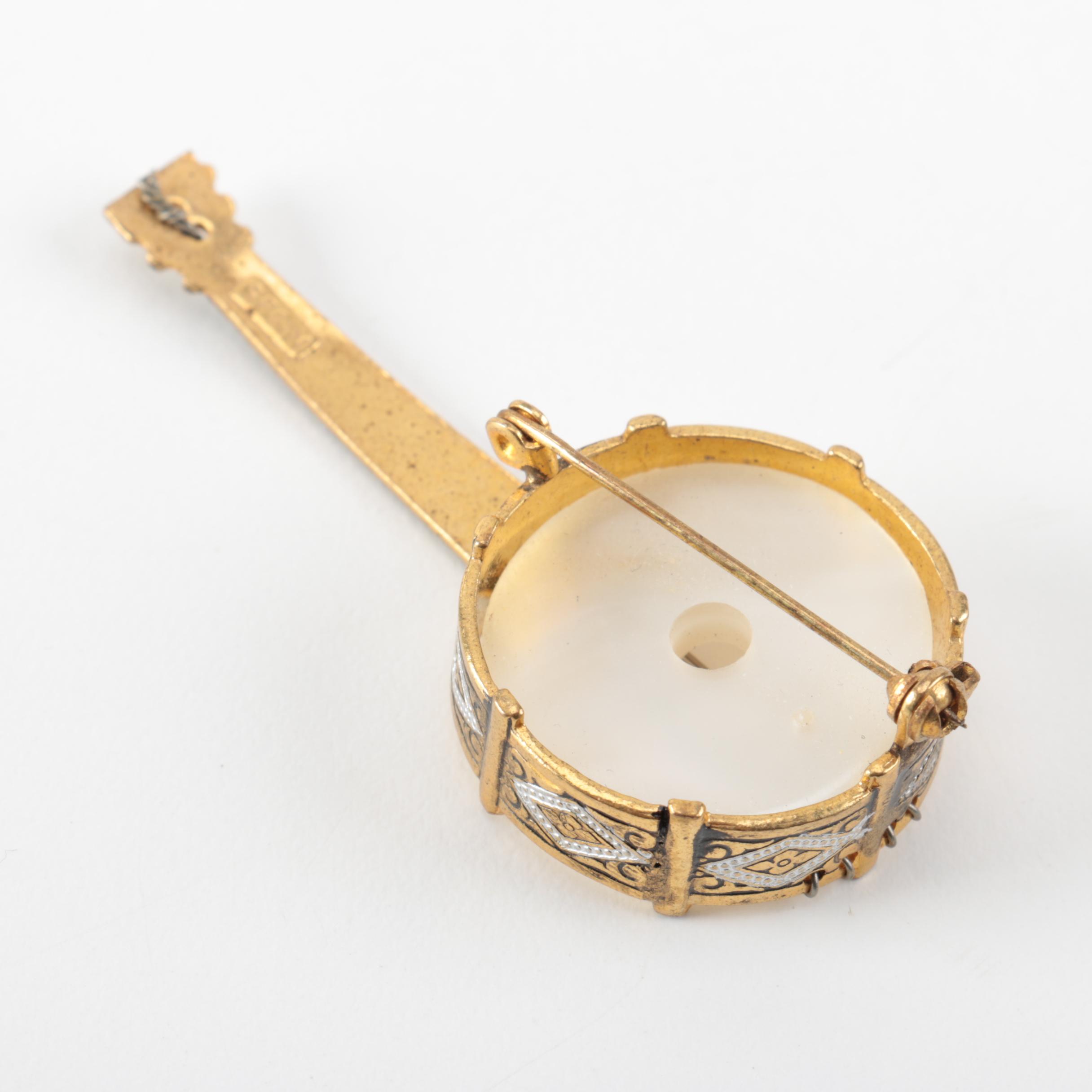 Grouping of Vintage Damascene Gold Tone Brooches and Trinket Box