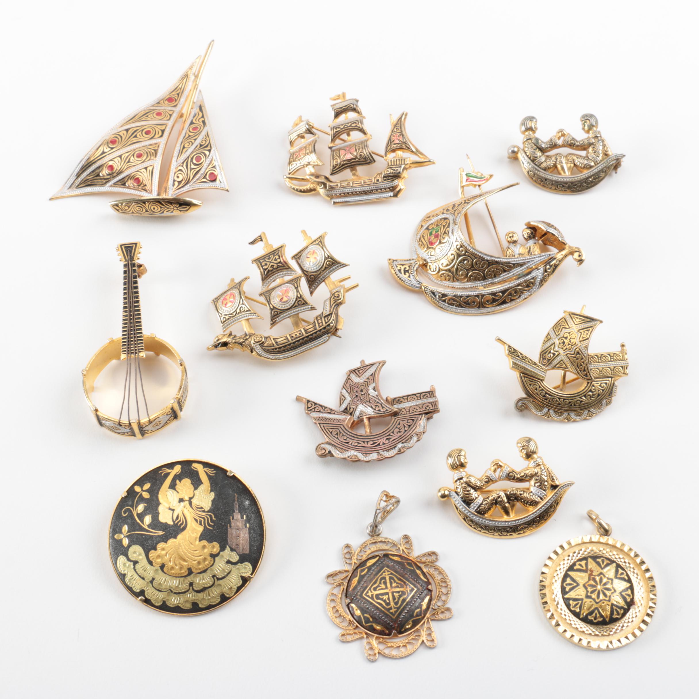 Grouping of Damascene Gold Toned Brooches and Pendants