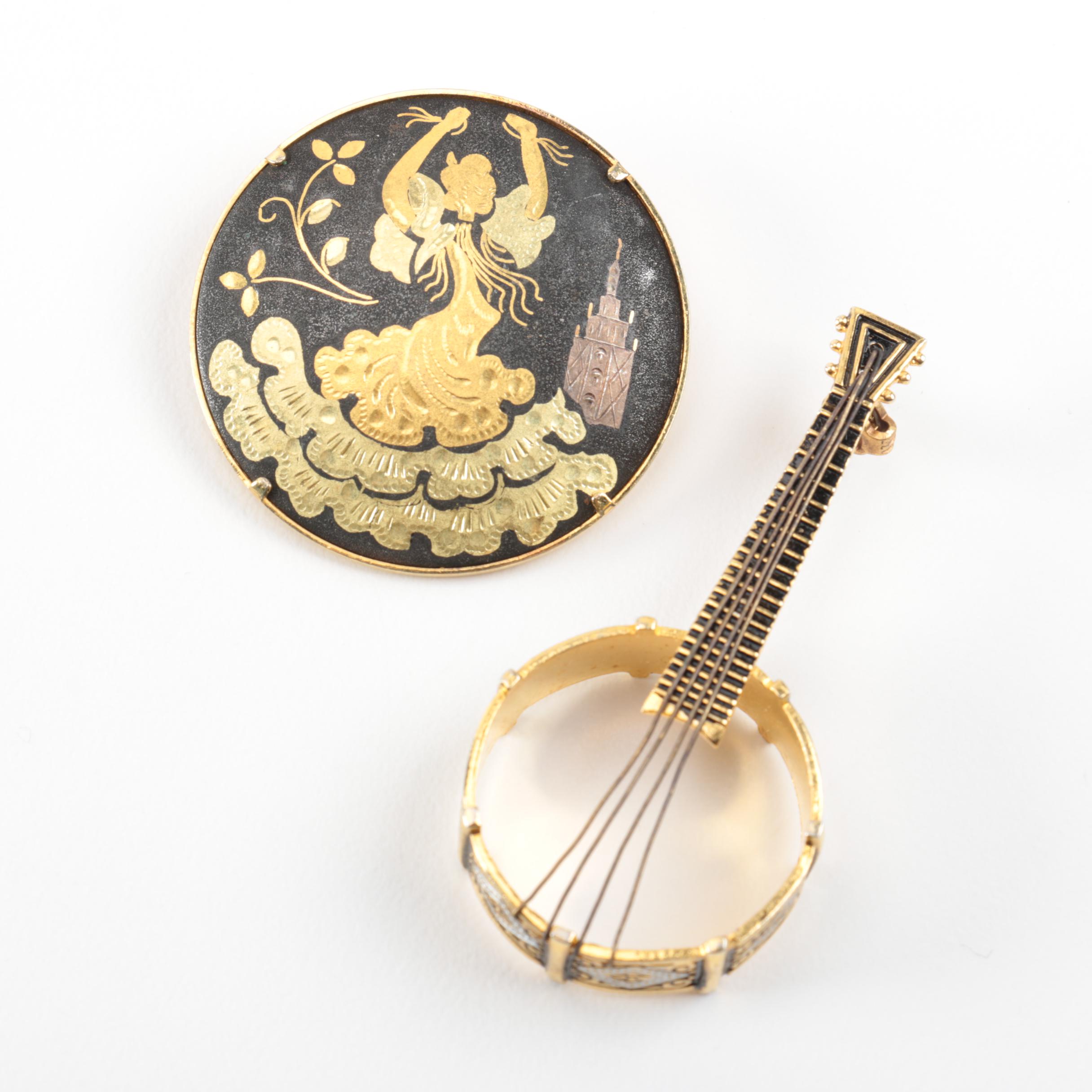 Grouping of Damascene Gold Toned Brooches and Pendants