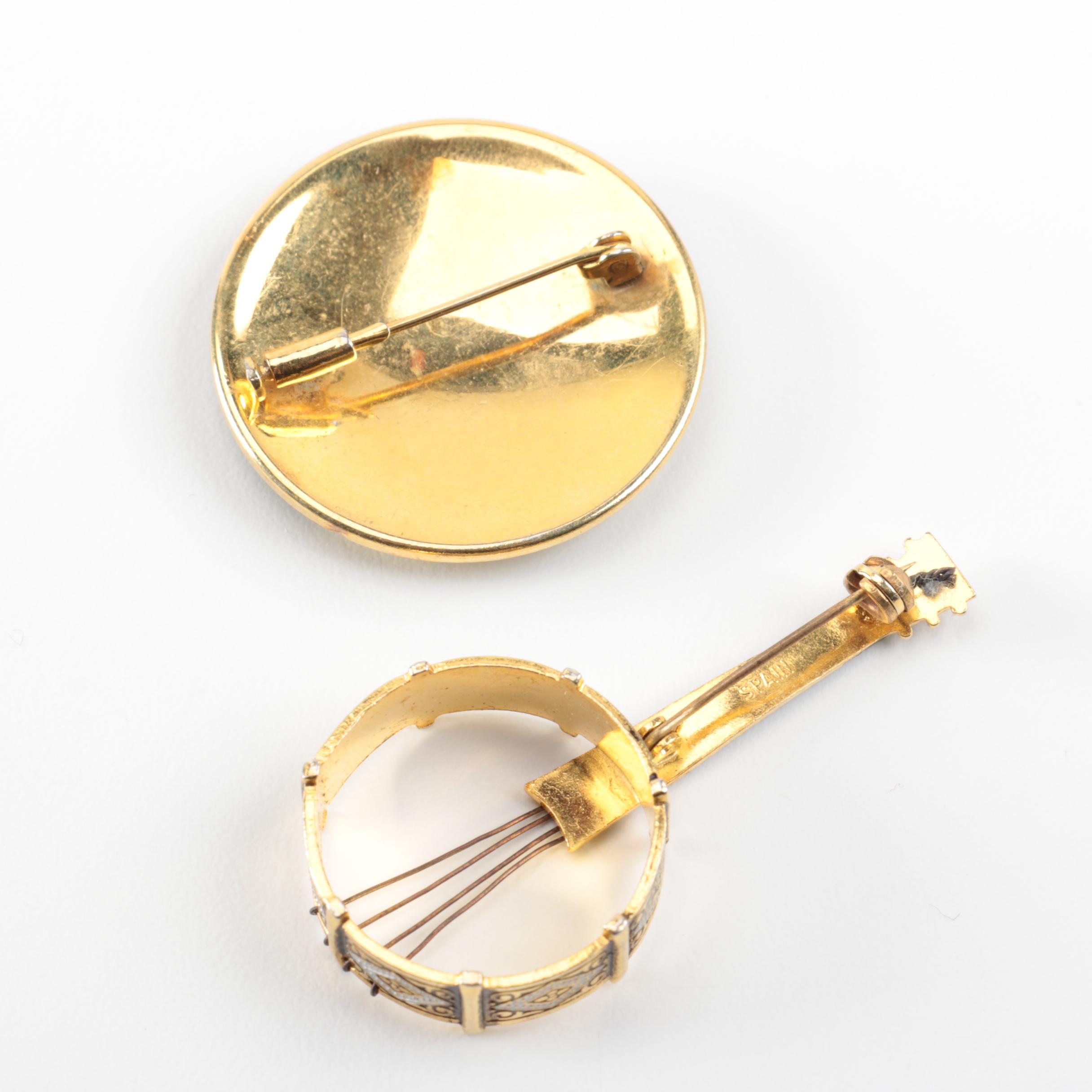 Grouping of Damascene Gold Toned Brooches and Pendants