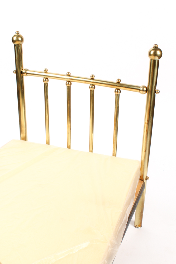 Brass Doll's Bed with Doll and Crochet Throw