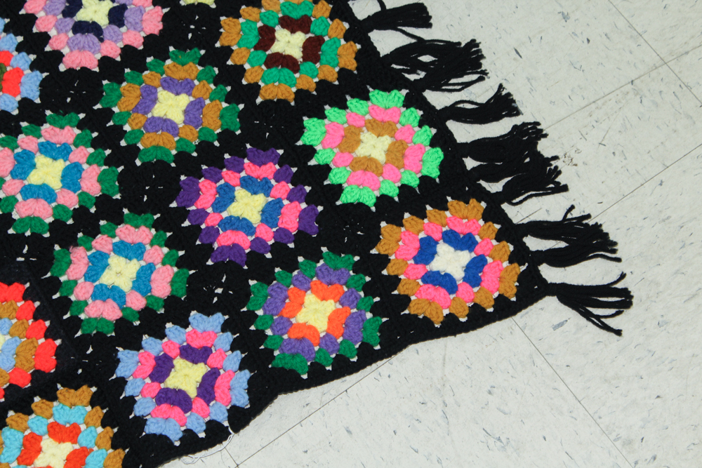 Brass Doll's Bed with Doll and Crochet Throw