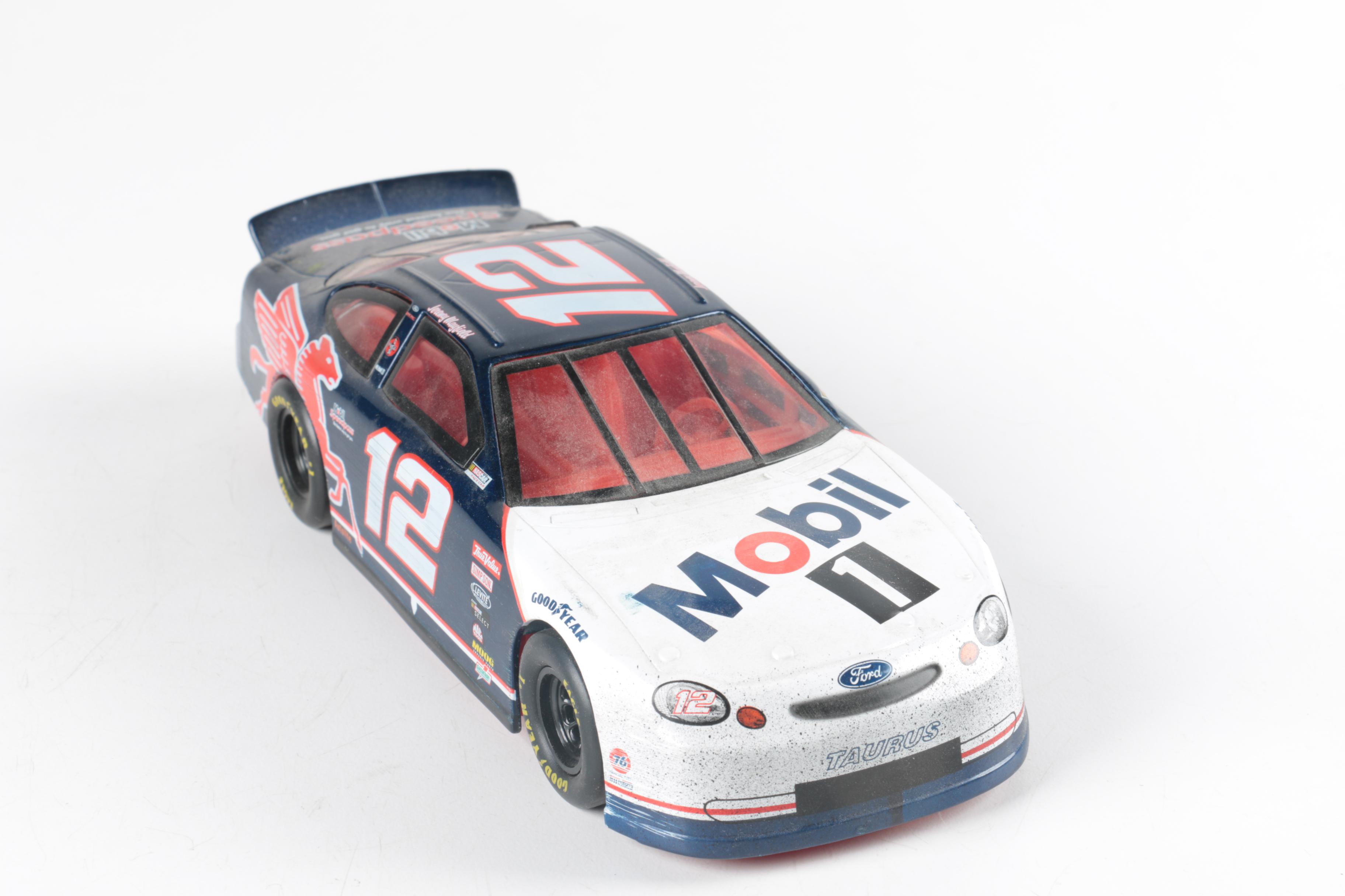 Seven NASCAR Replica Toy Cars