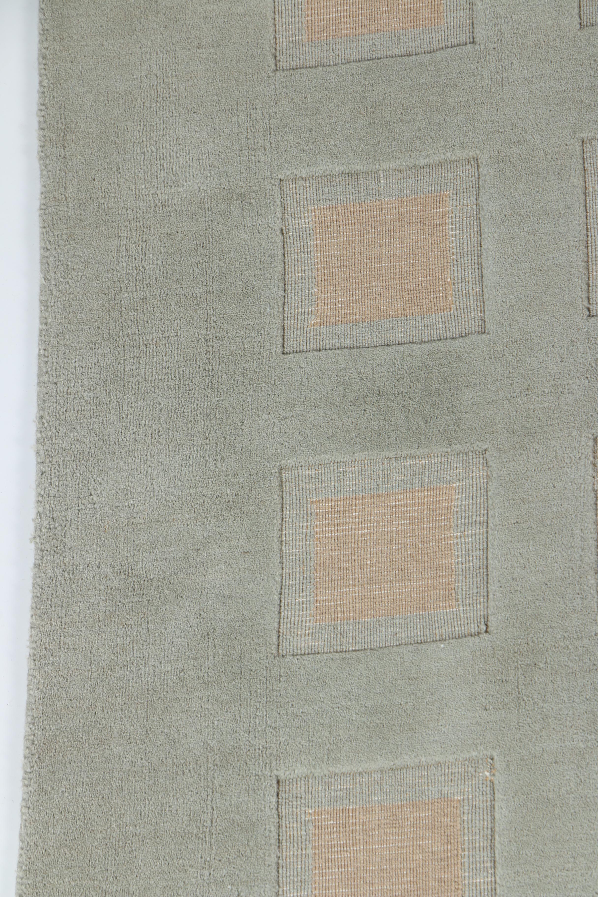 Hand-Tufted and Woven Trans-Ocean Wool Area Rug