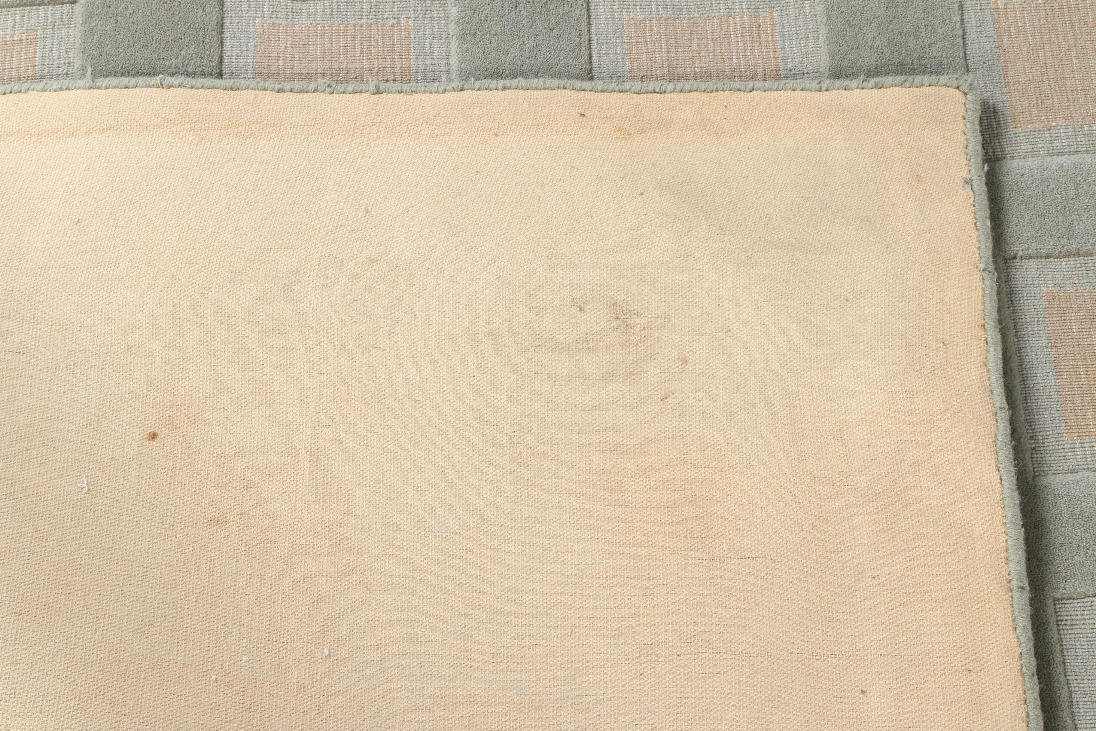 Hand-Tufted and Woven Trans-Ocean Wool Area Rug