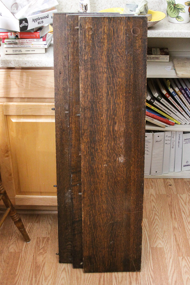 Vintage Tiger Oak Pedestal Dining Table with Leaf Inserts