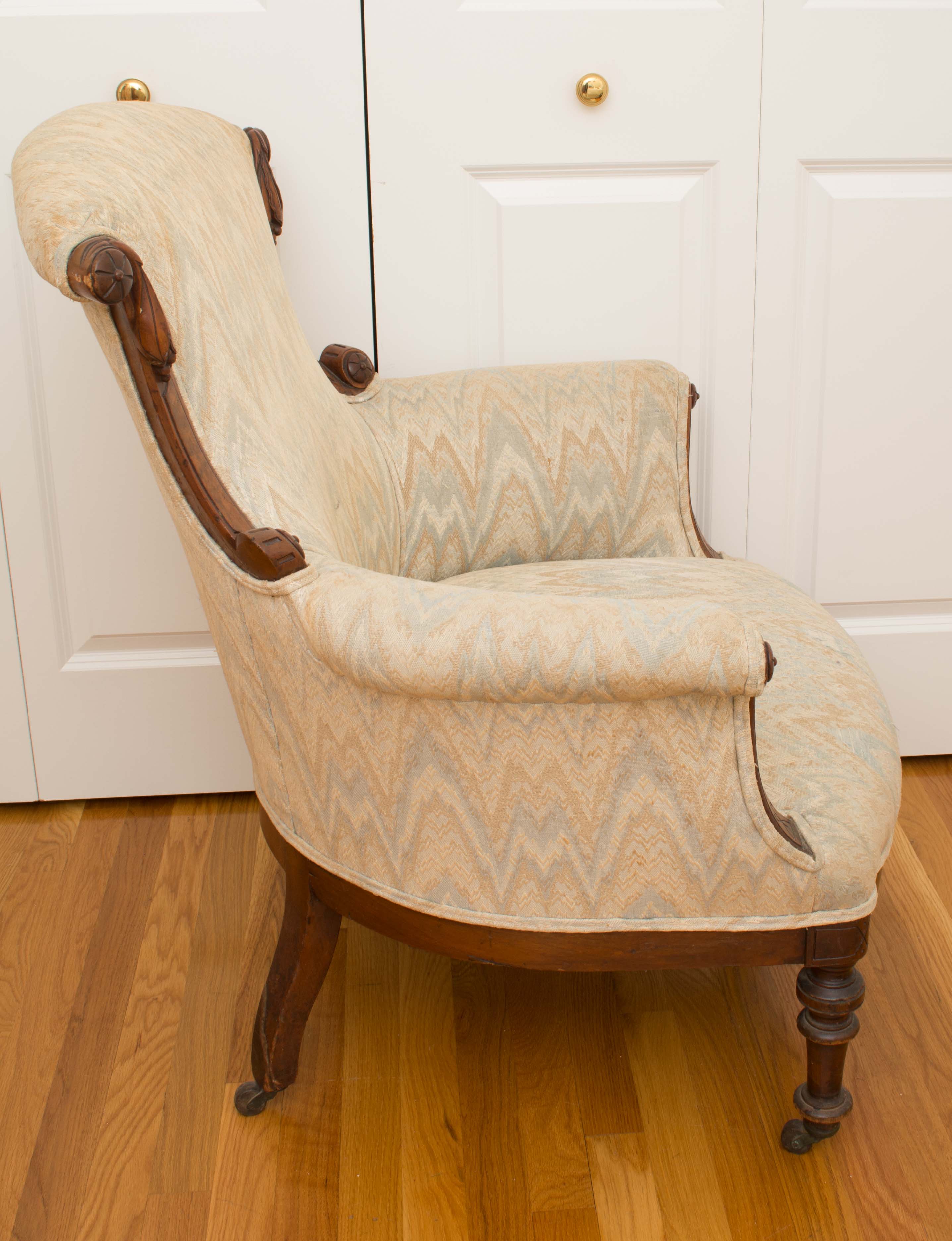 Antique Wingback Chair With Exposed Walnut Frame