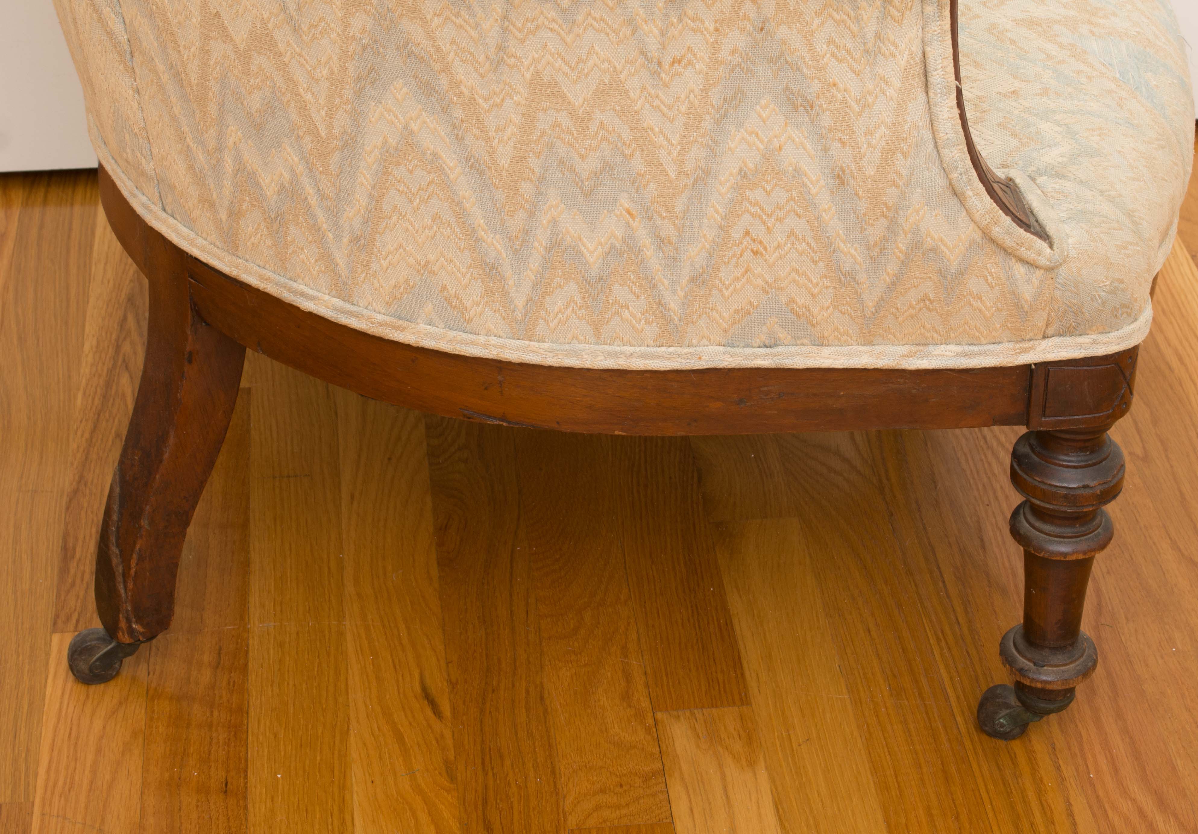 Antique Wingback Chair With Exposed Walnut Frame