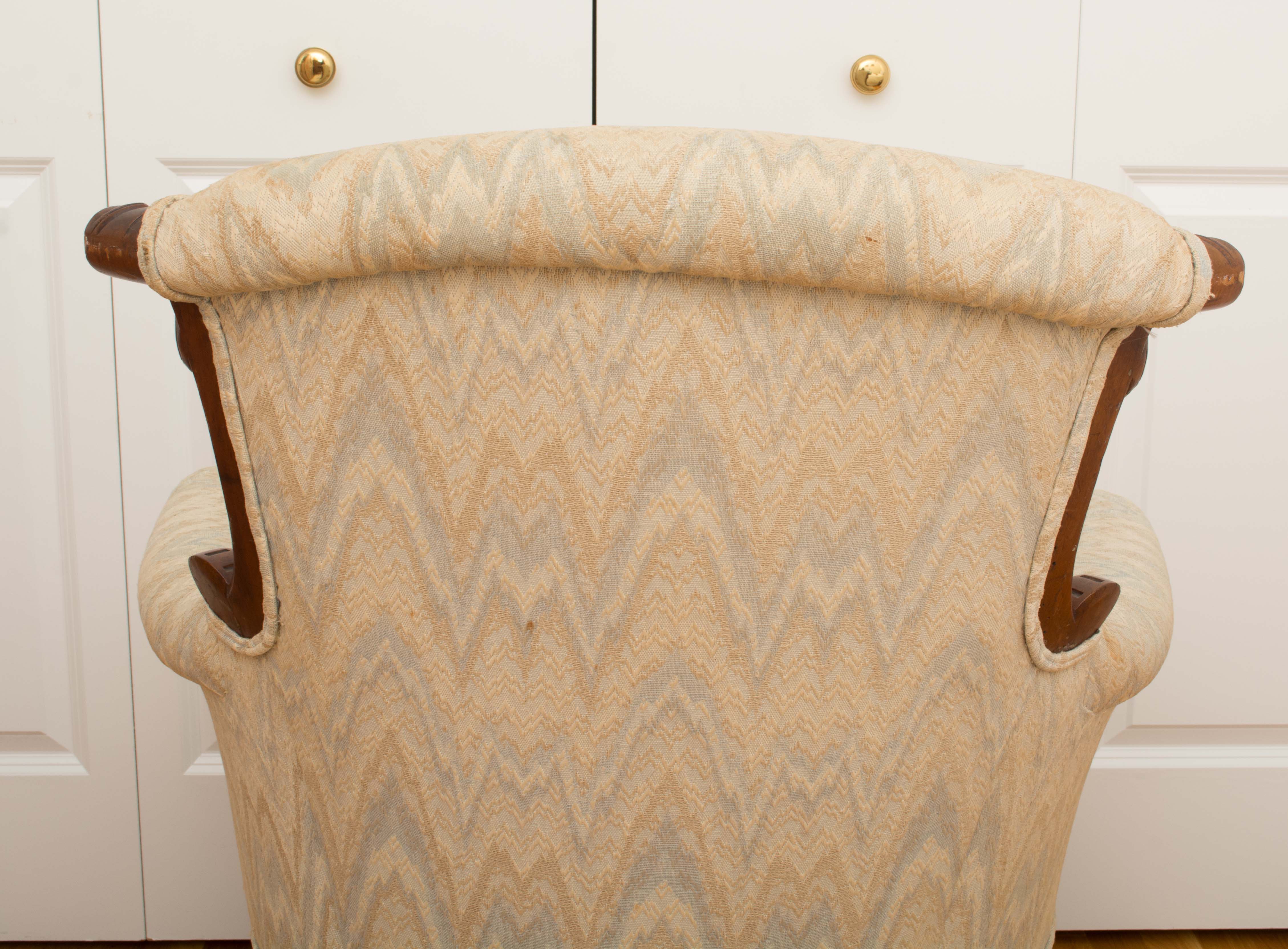 Antique Wingback Chair With Exposed Walnut Frame