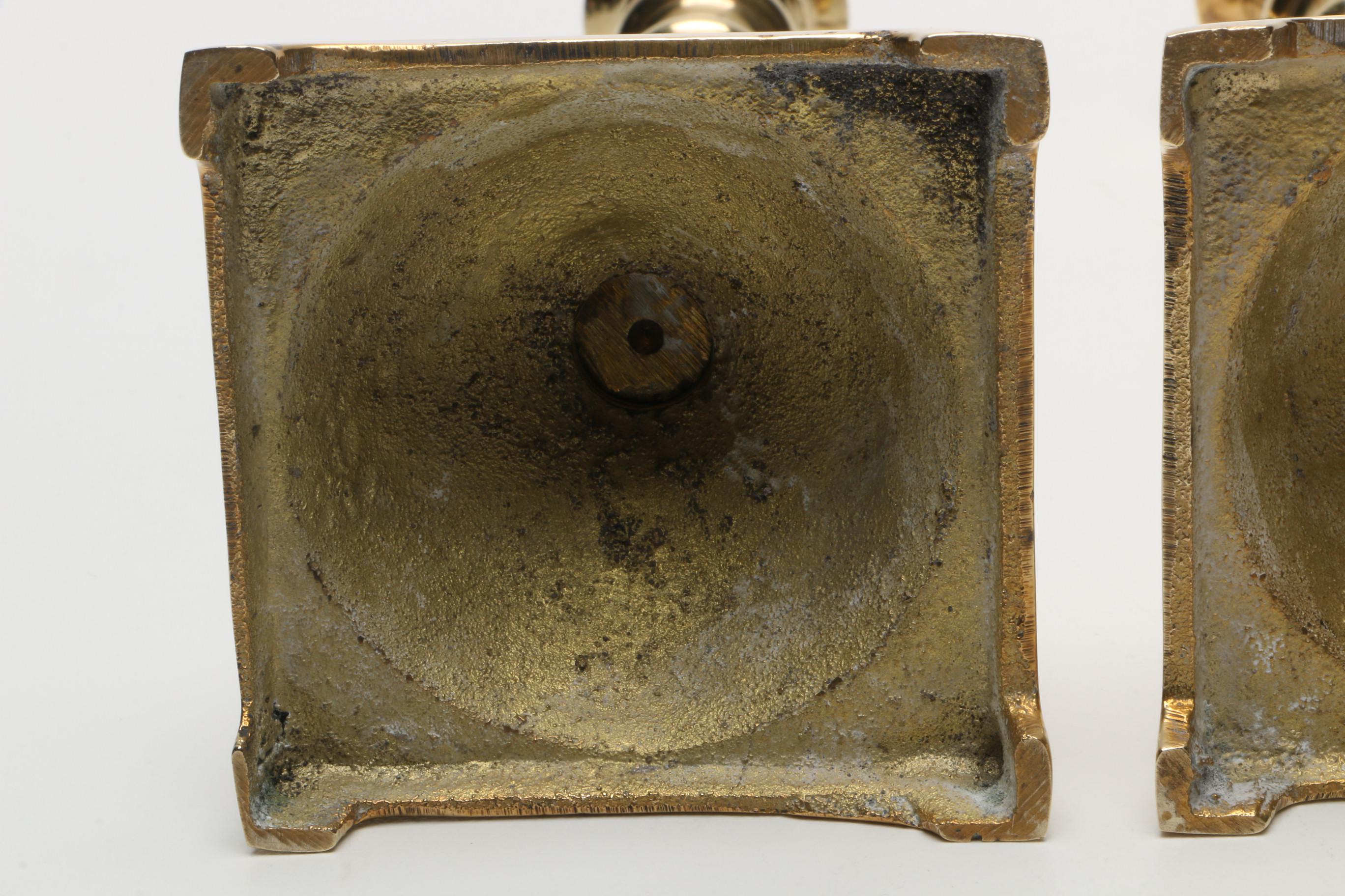 Brass Candlesticks and Silver-Tone Candleholder