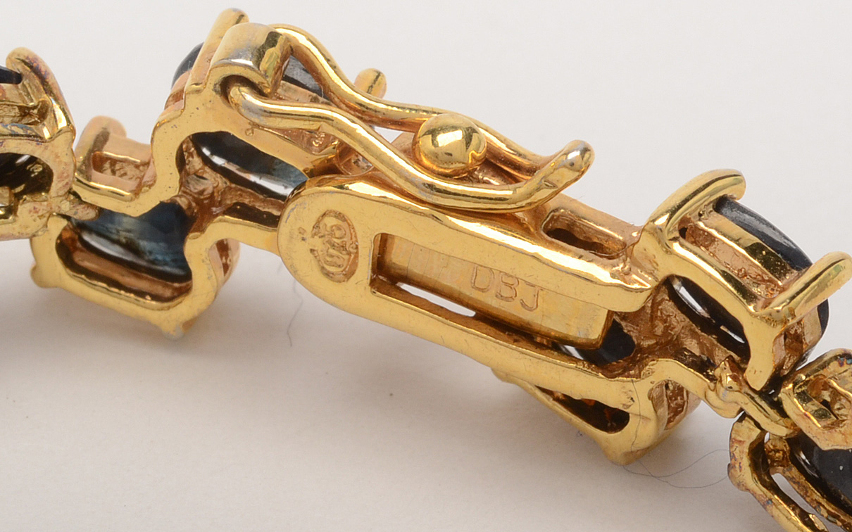 Sterling Silver Sapphire Tennis Bracelet and Dyed Coral Ring