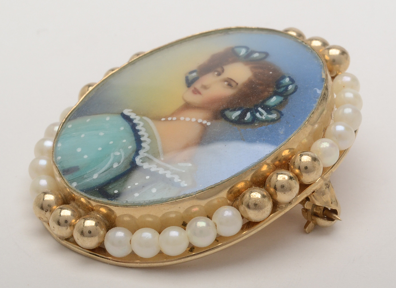 Vintage Alice Caviness and Portrait of Auguste Strobl Brooches