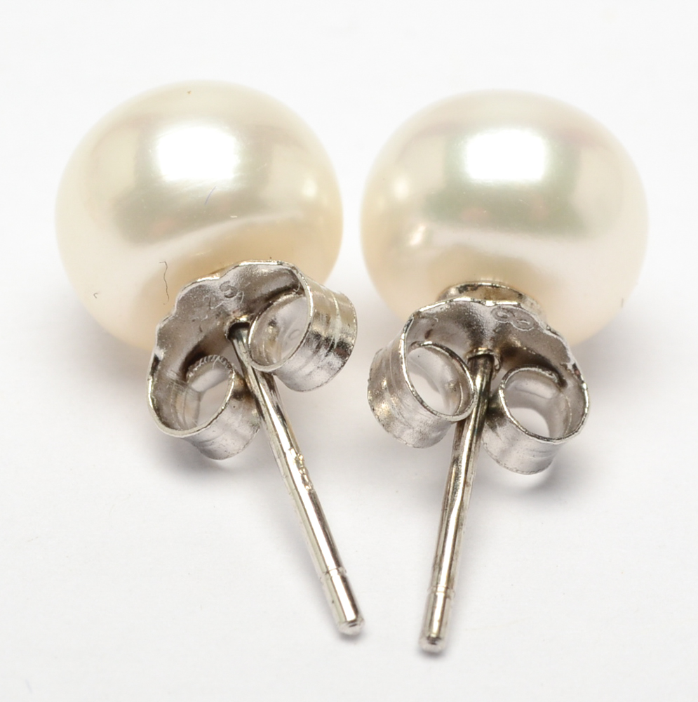 Sterling Silver and White Freshwater Pearl Necklace and Earrings