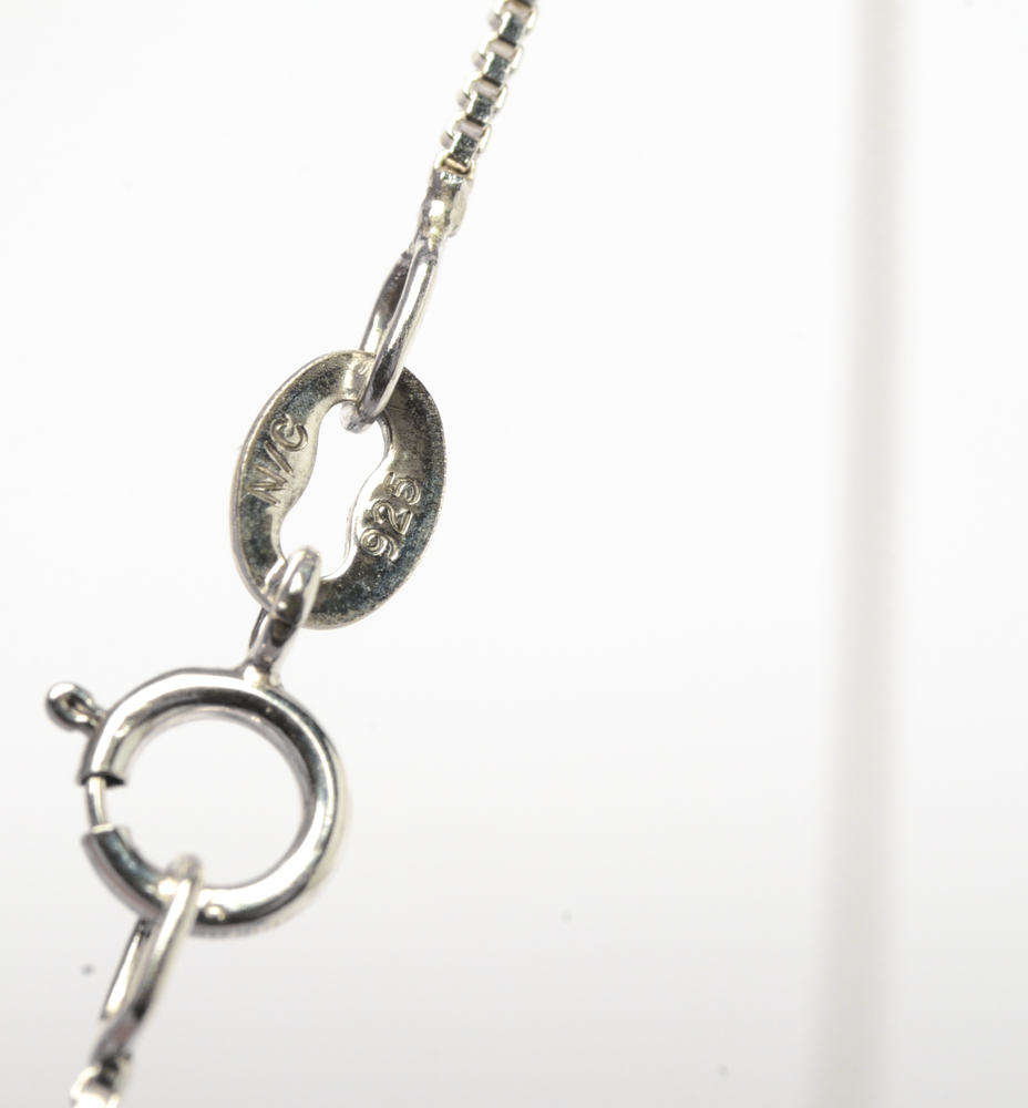 Sterling Silver and White Freshwater Pearl Necklace and Earrings