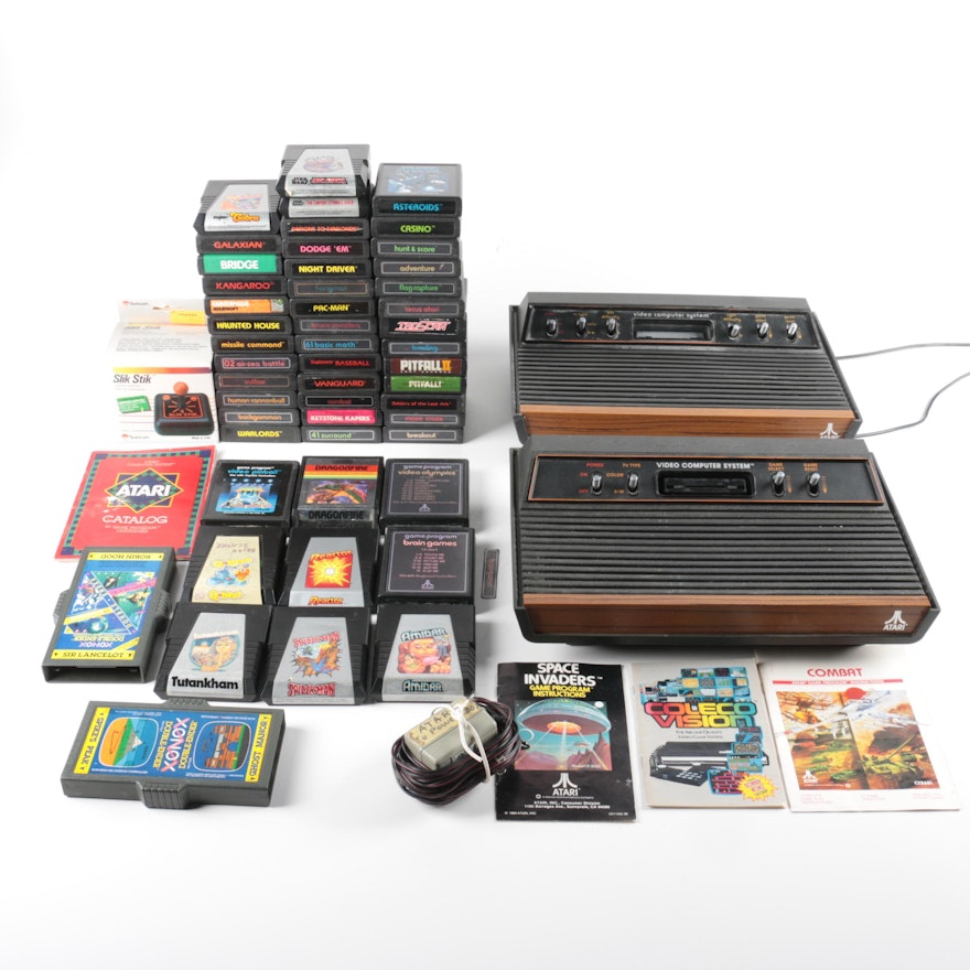 Vintage Atari Video Computer Systems with Games and Accessories