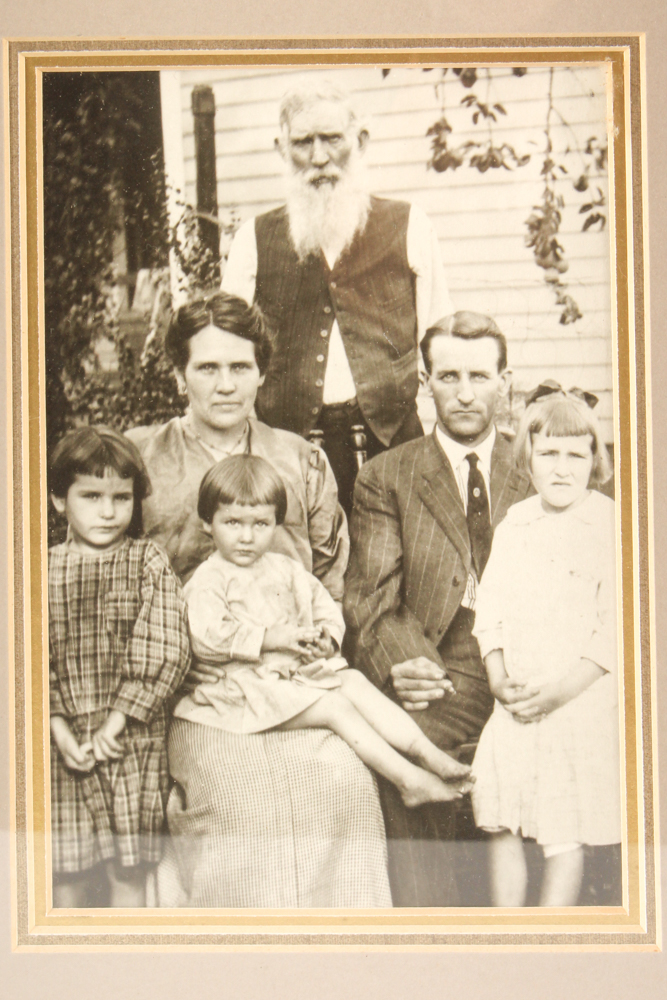 Antique Portraits in Hand-Detailed Frames