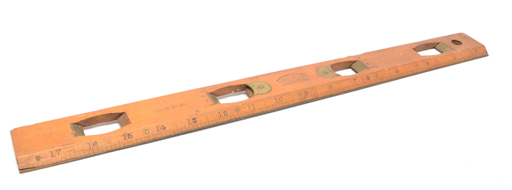 Collection of Vintage Wooden Rulers and Tool Chest Display