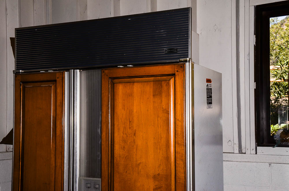 Sub-Zero 690/F Refrigerator with Wood Paneling