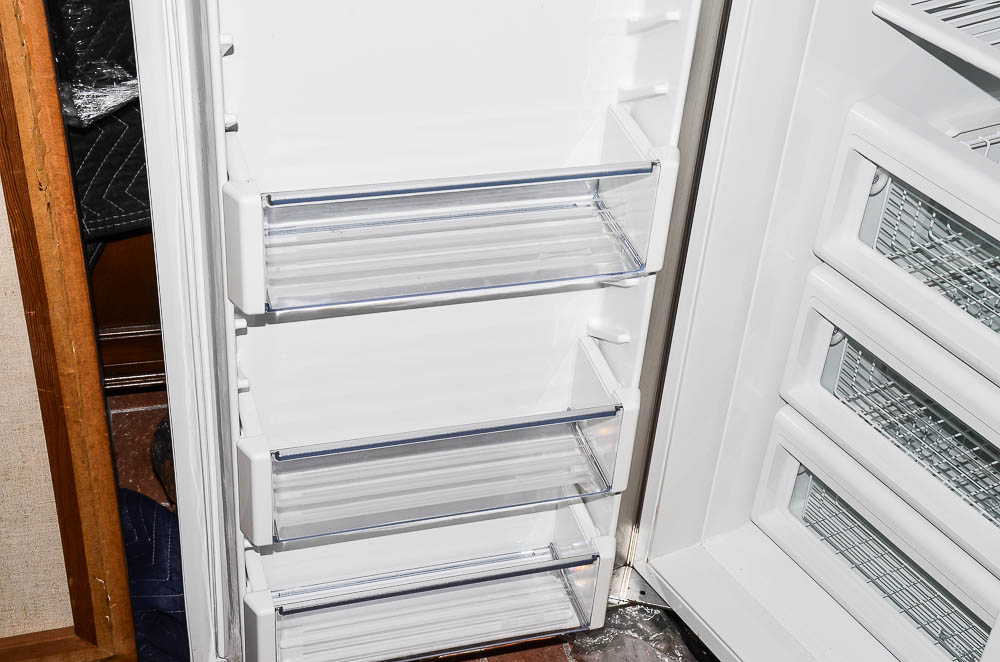 Sub-Zero 690/F Refrigerator with Wood Paneling