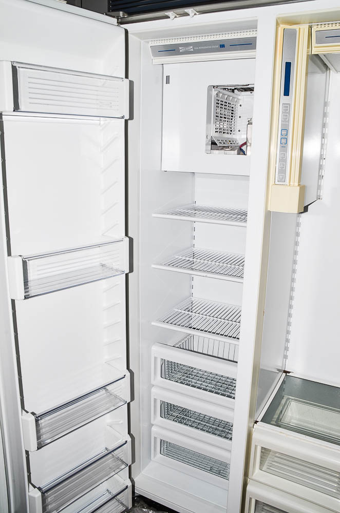 Sub-Zero 690/F Refrigerator with Wood Paneling