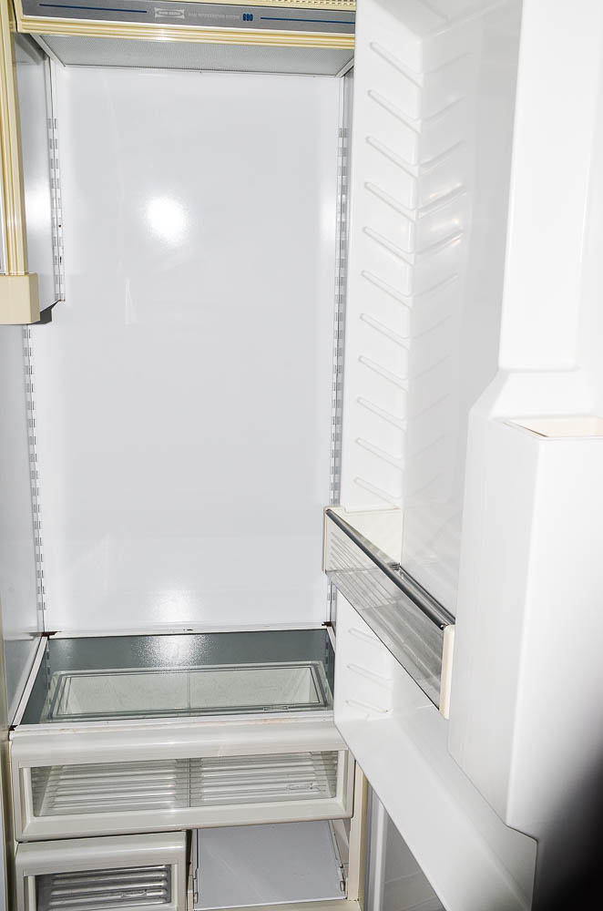 Sub-Zero 690/F Refrigerator with Wood Paneling