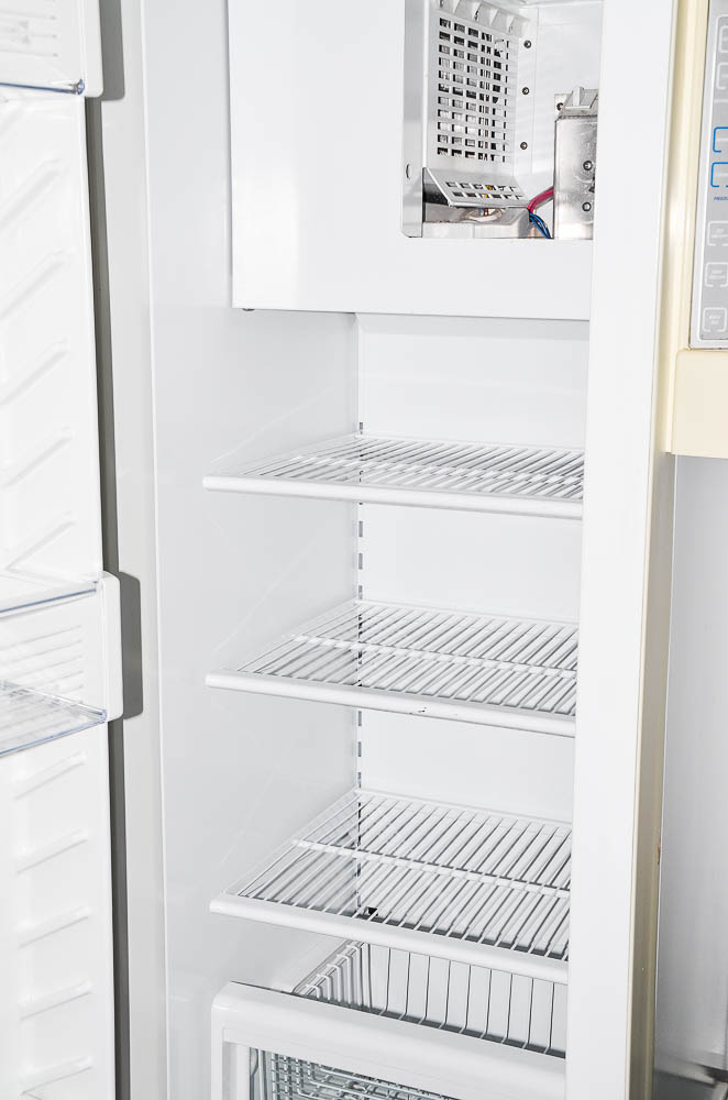 Sub-Zero 690/F Refrigerator with Wood Paneling