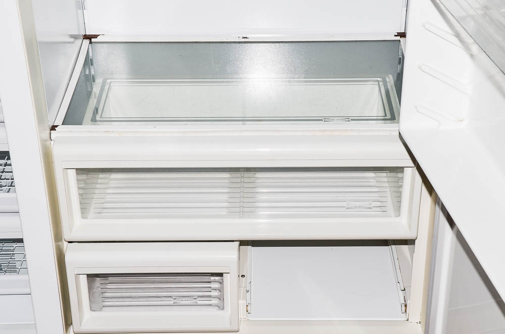 Sub-Zero 690/F Refrigerator with Wood Paneling