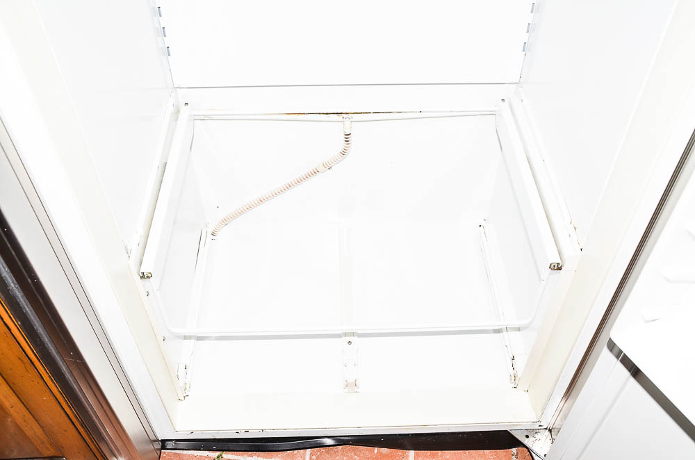 Sub-Zero 690/F Refrigerator with Wood Paneling