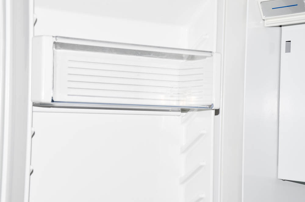 Sub-Zero 690/F Refrigerator with Wood Paneling