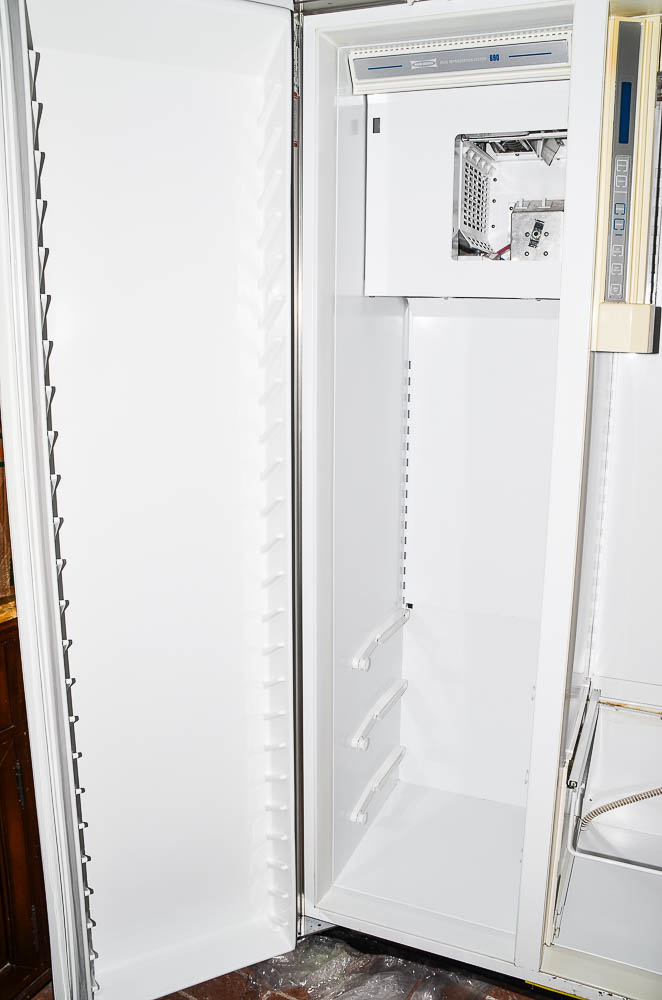 Sub-Zero 690/F Refrigerator with Wood Paneling