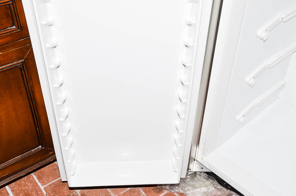 Sub-Zero 690/F Refrigerator with Wood Paneling