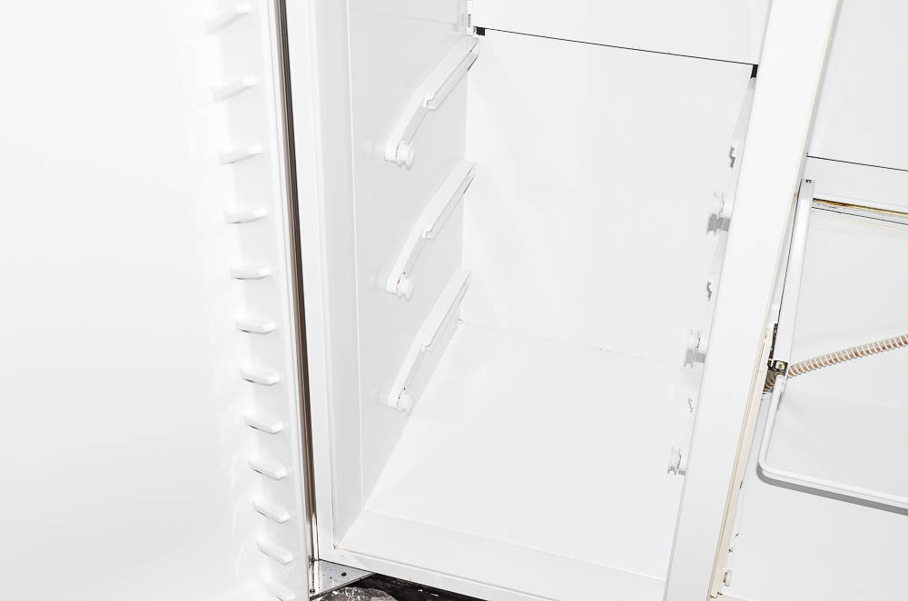 Sub-Zero 690/F Refrigerator with Wood Paneling