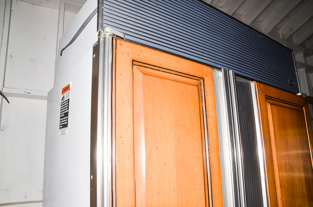 Sub-Zero 690/F Refrigerator with Wood Paneling